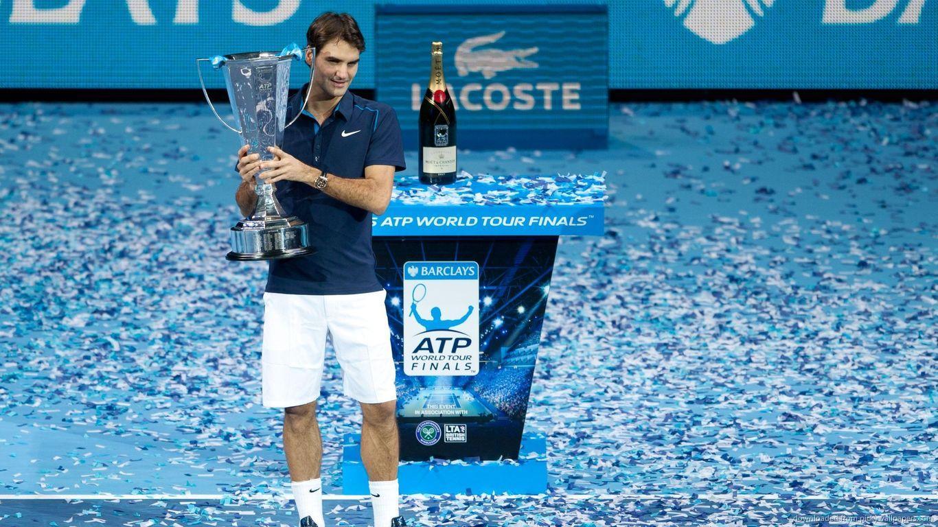 Download 1366x768 Roger Federer With Cup Wallpaper