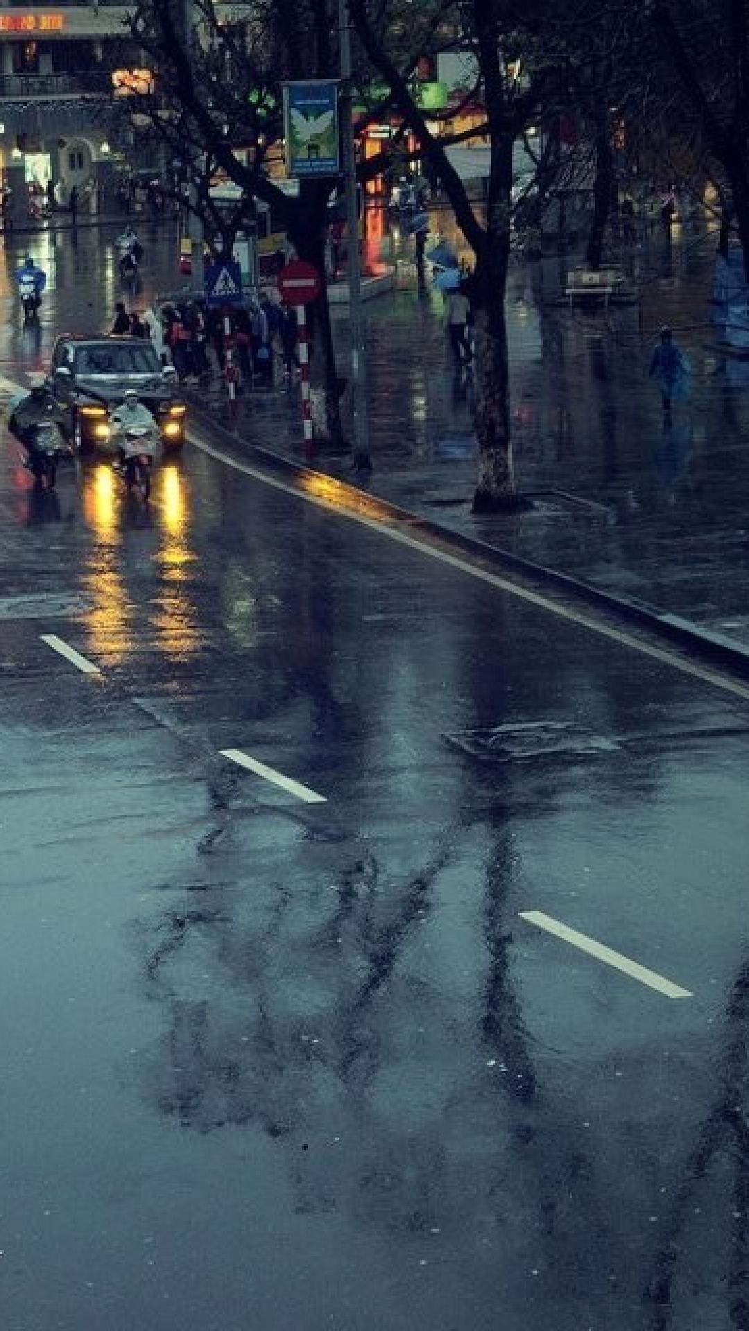 Cityscapes streets rain cars roads motorbikes umbrellas hanoi
