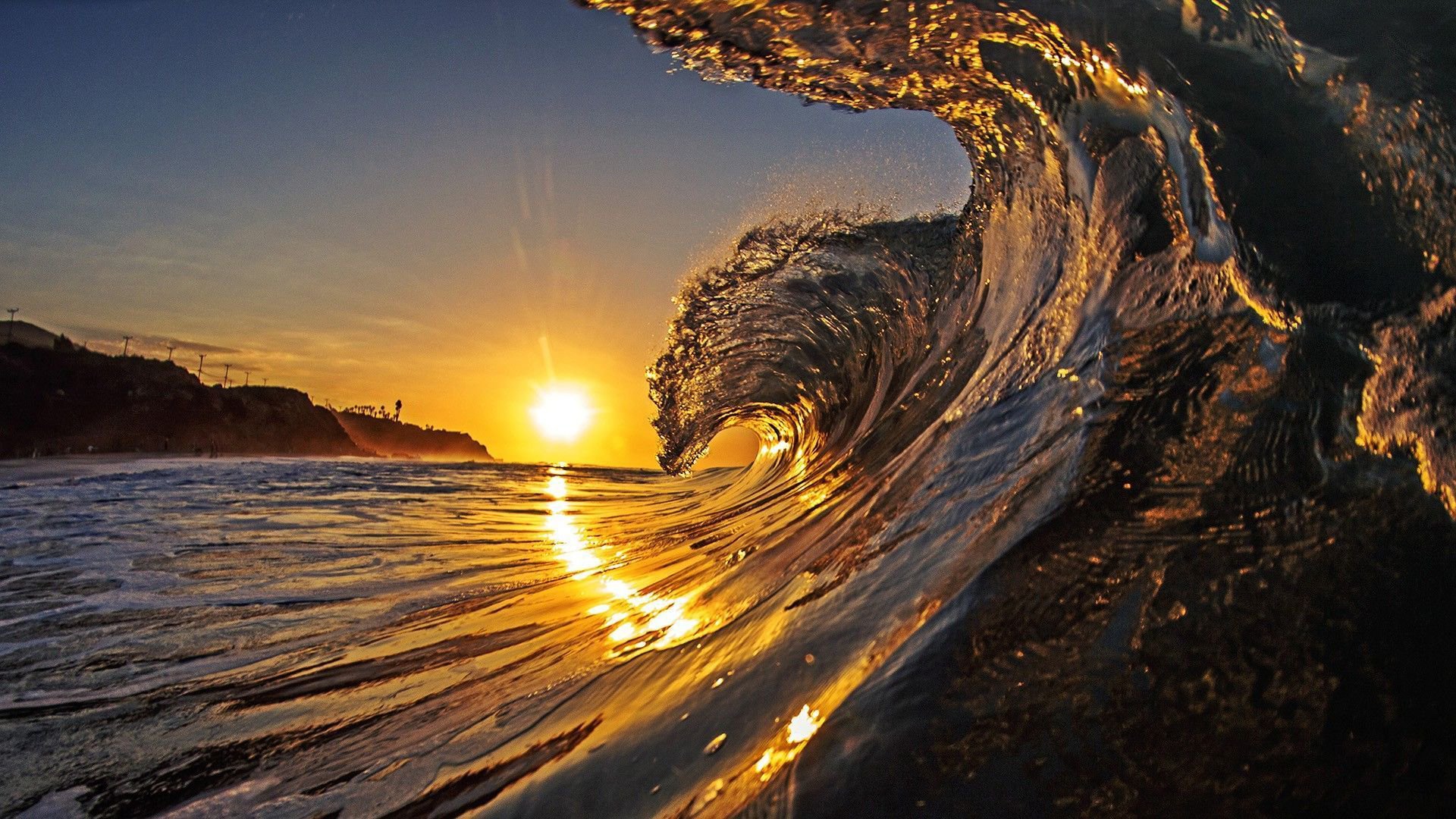 Wave in the sunset 1920x1080 beach wallpaper