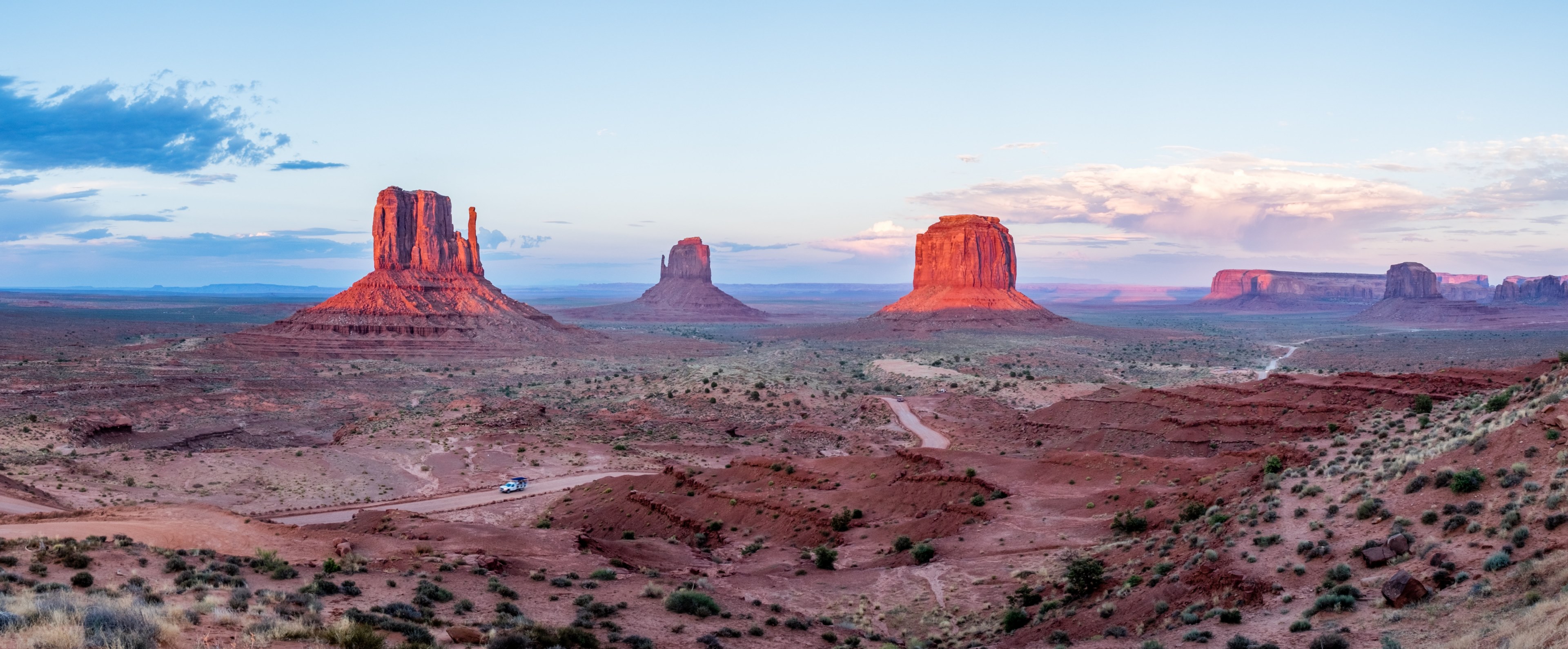 sunsets in the monument valley 4k wallpaper and background