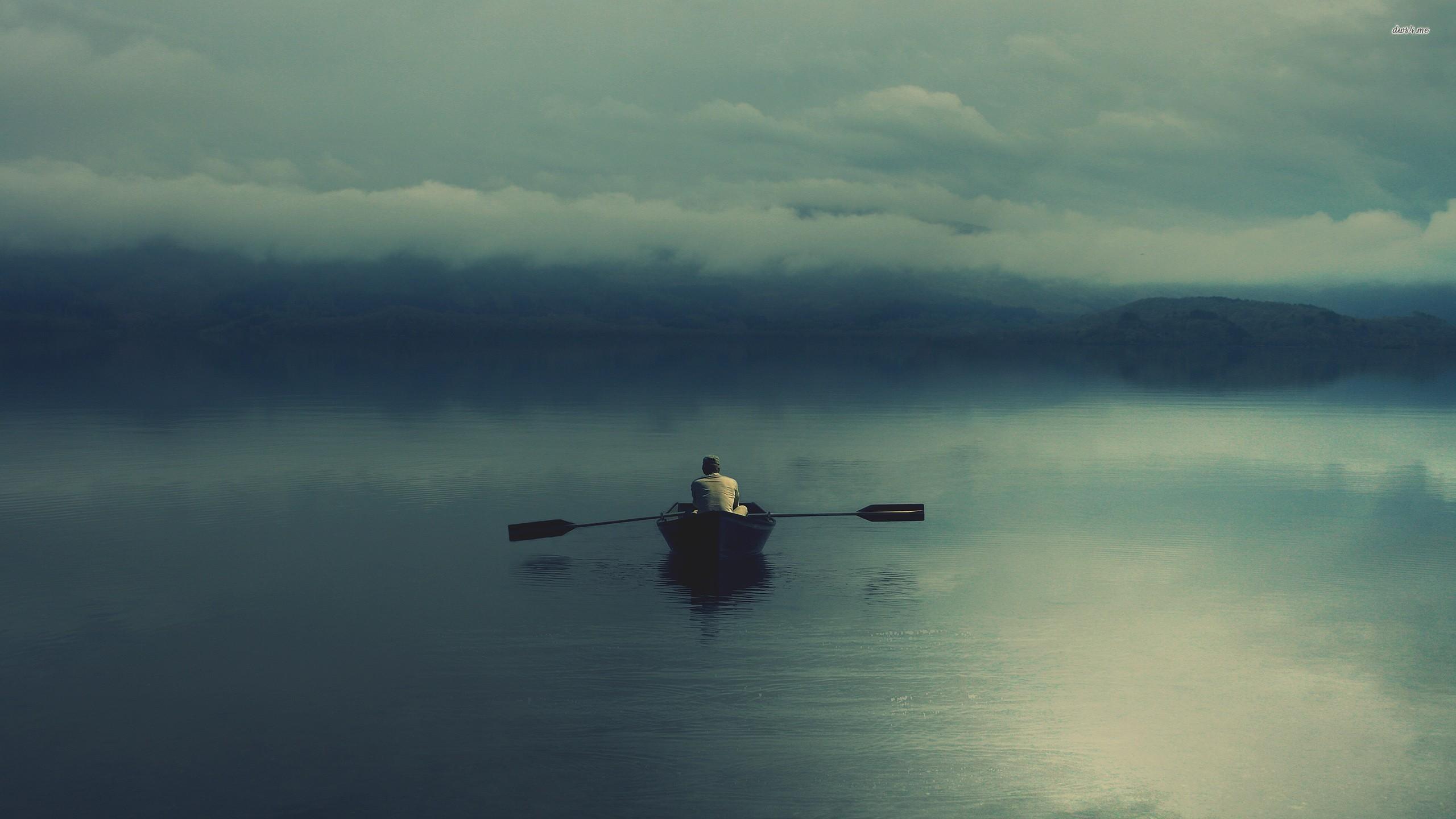 Man rowing on the dark lake wallpaper wallpaper