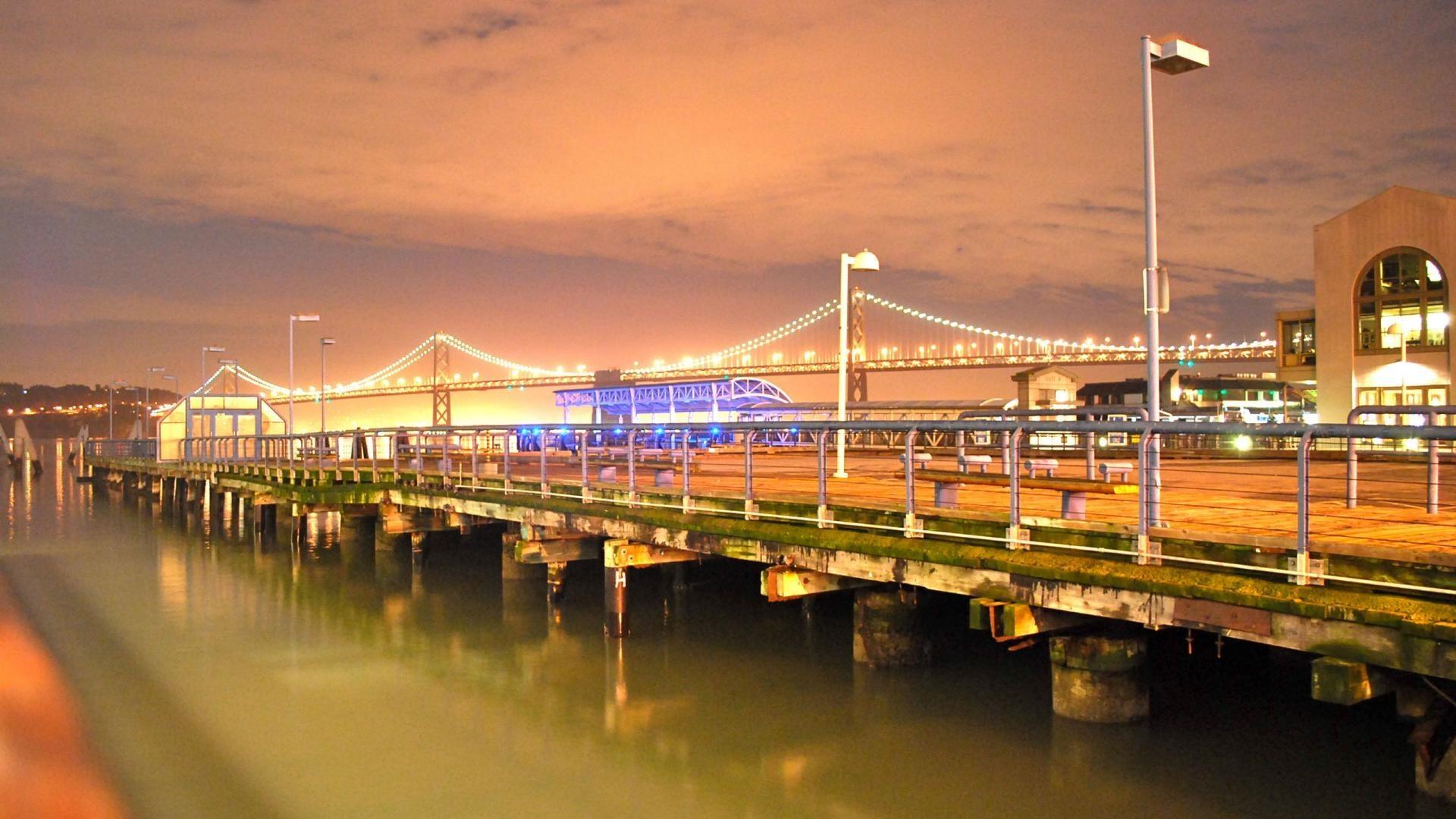 Oakland bay bridge from a pier in frisco wallpaper