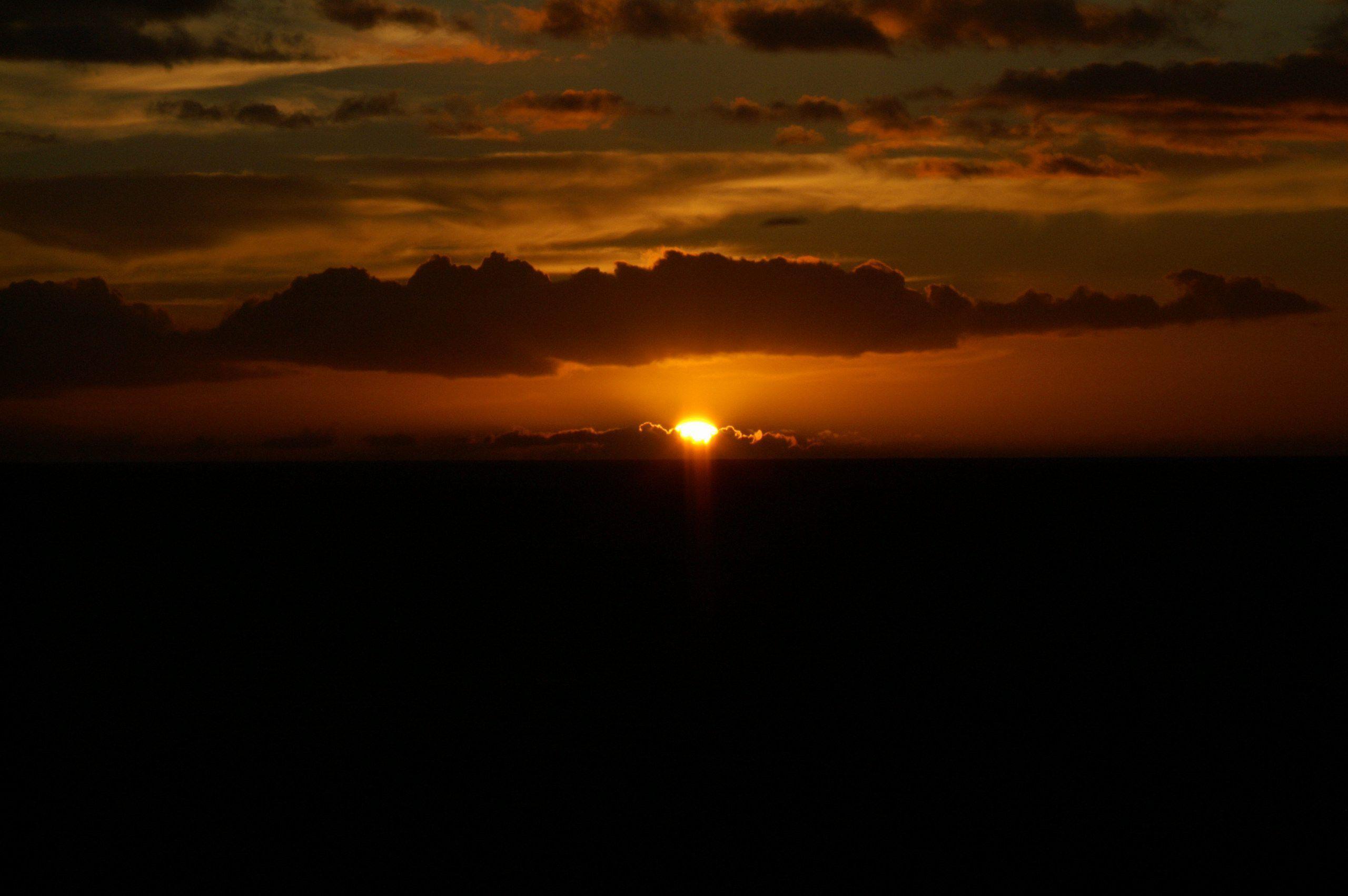 Ambient Glow Of A Beautiful Hawaiian Sunset. United States, USA