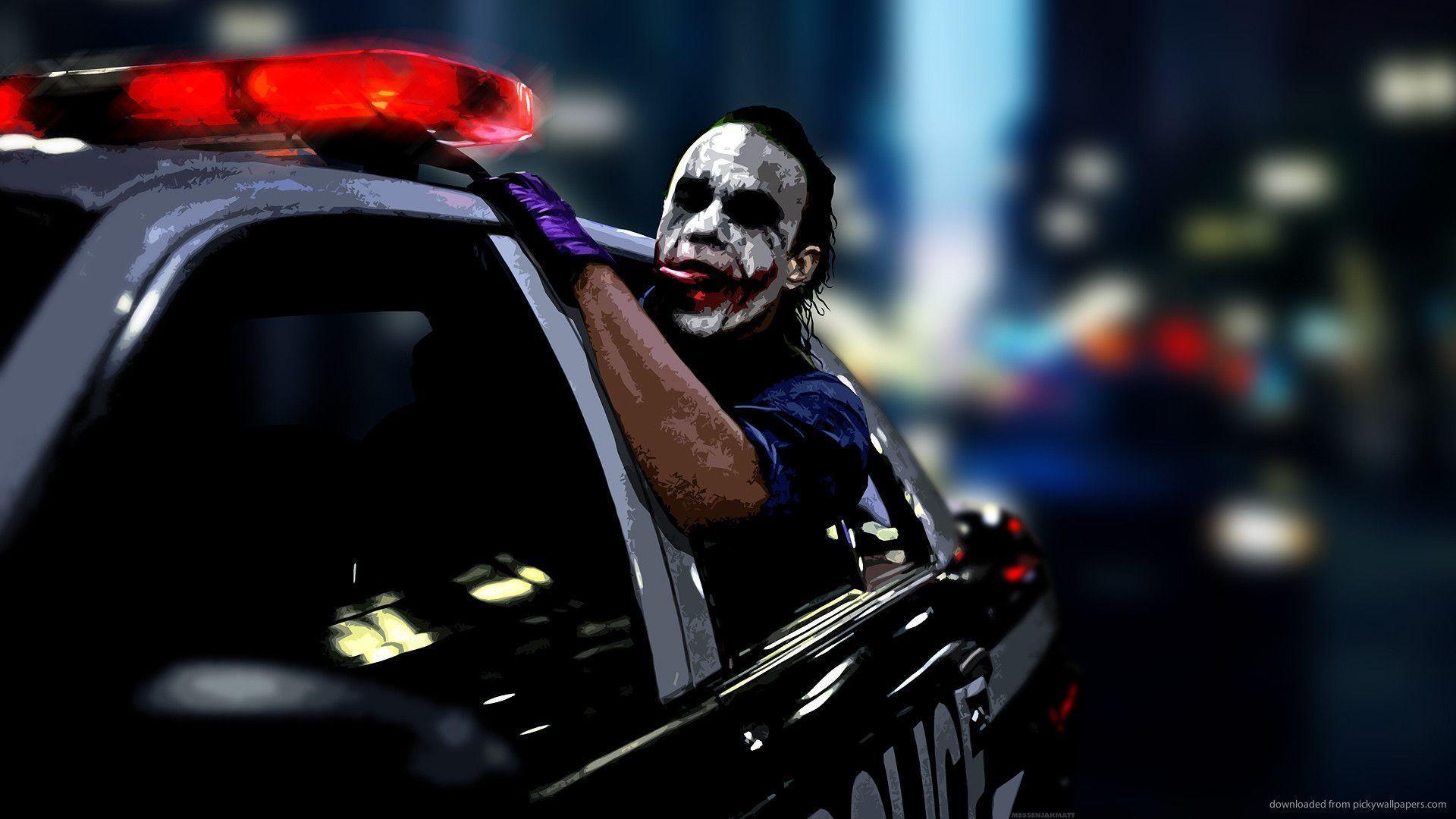Download 1920x1080 Joker Driving In A Police Car Wallpaper