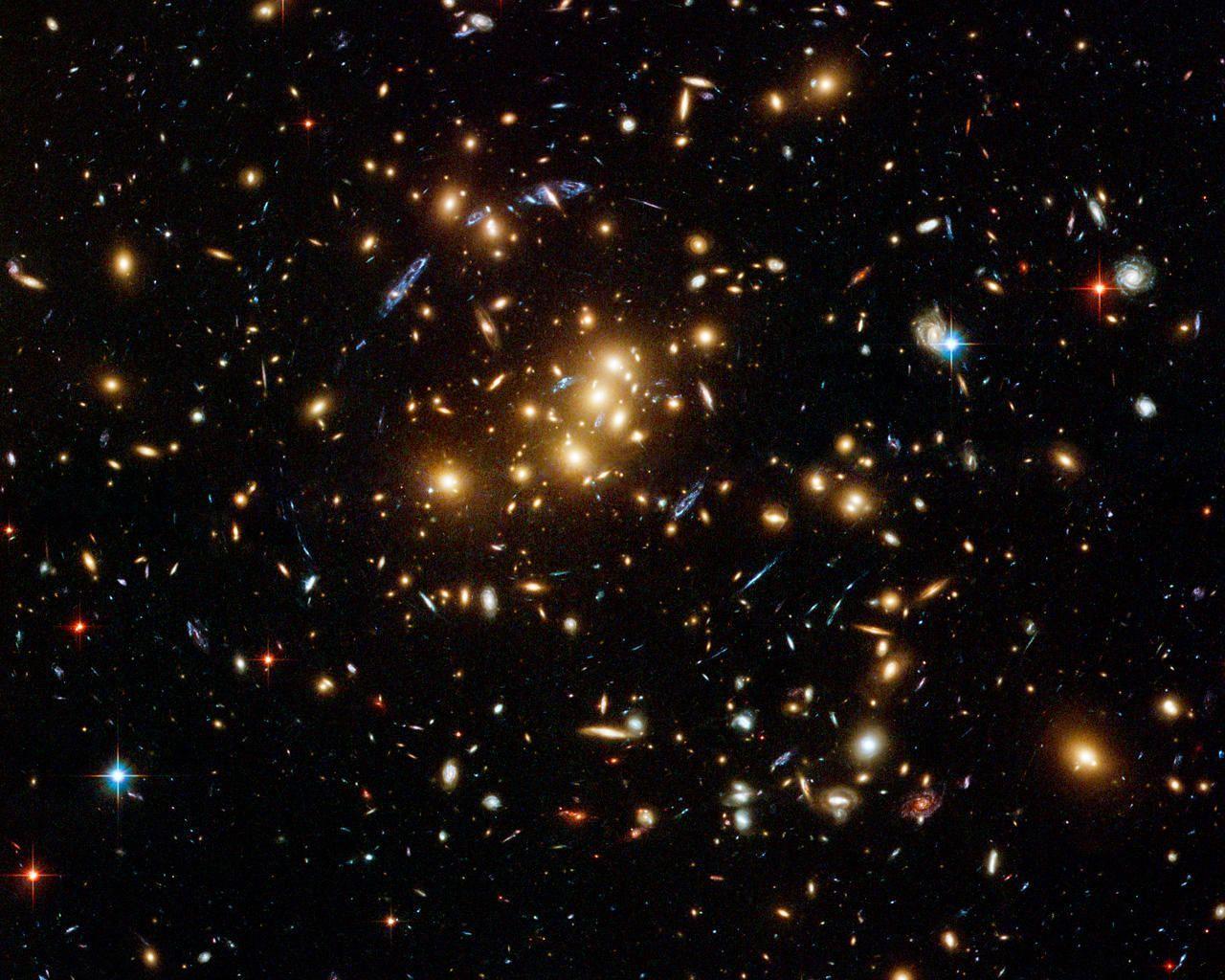 Hubble finds dark matter ring in galaxy cluster taken from Hubble