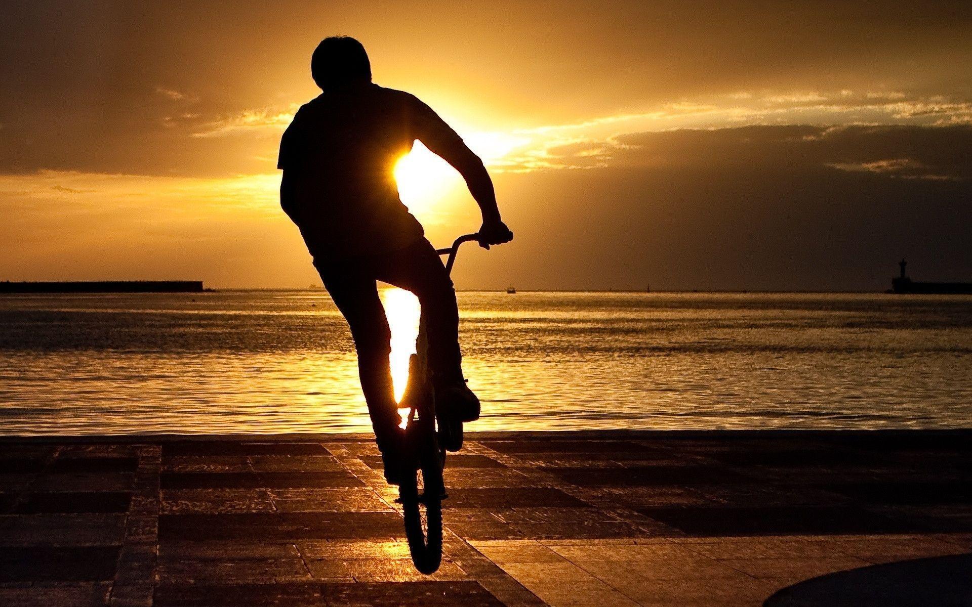 Freestyle Biking at Sunset HD Wallpaper