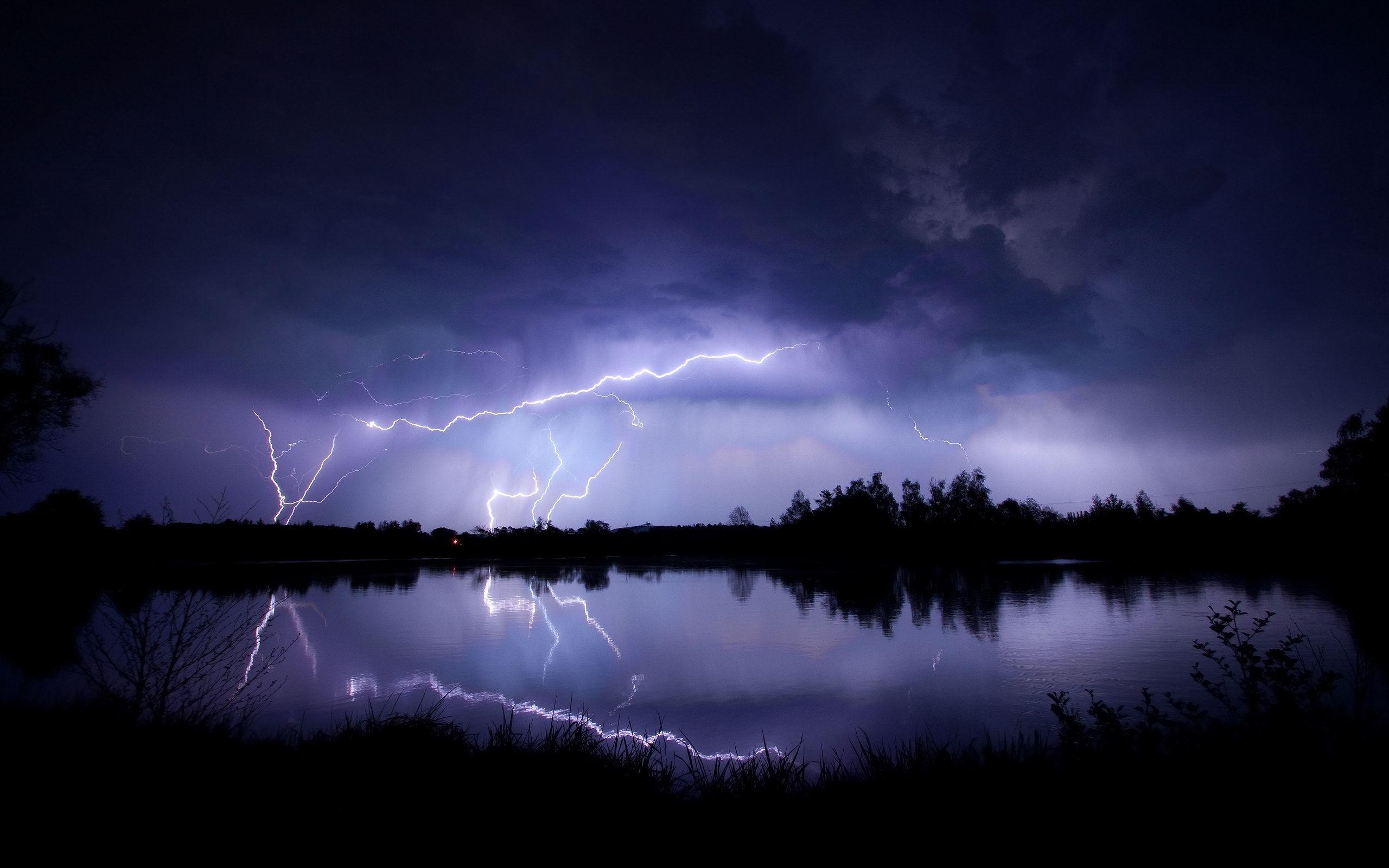 Lightning Storm over a Lake at night
