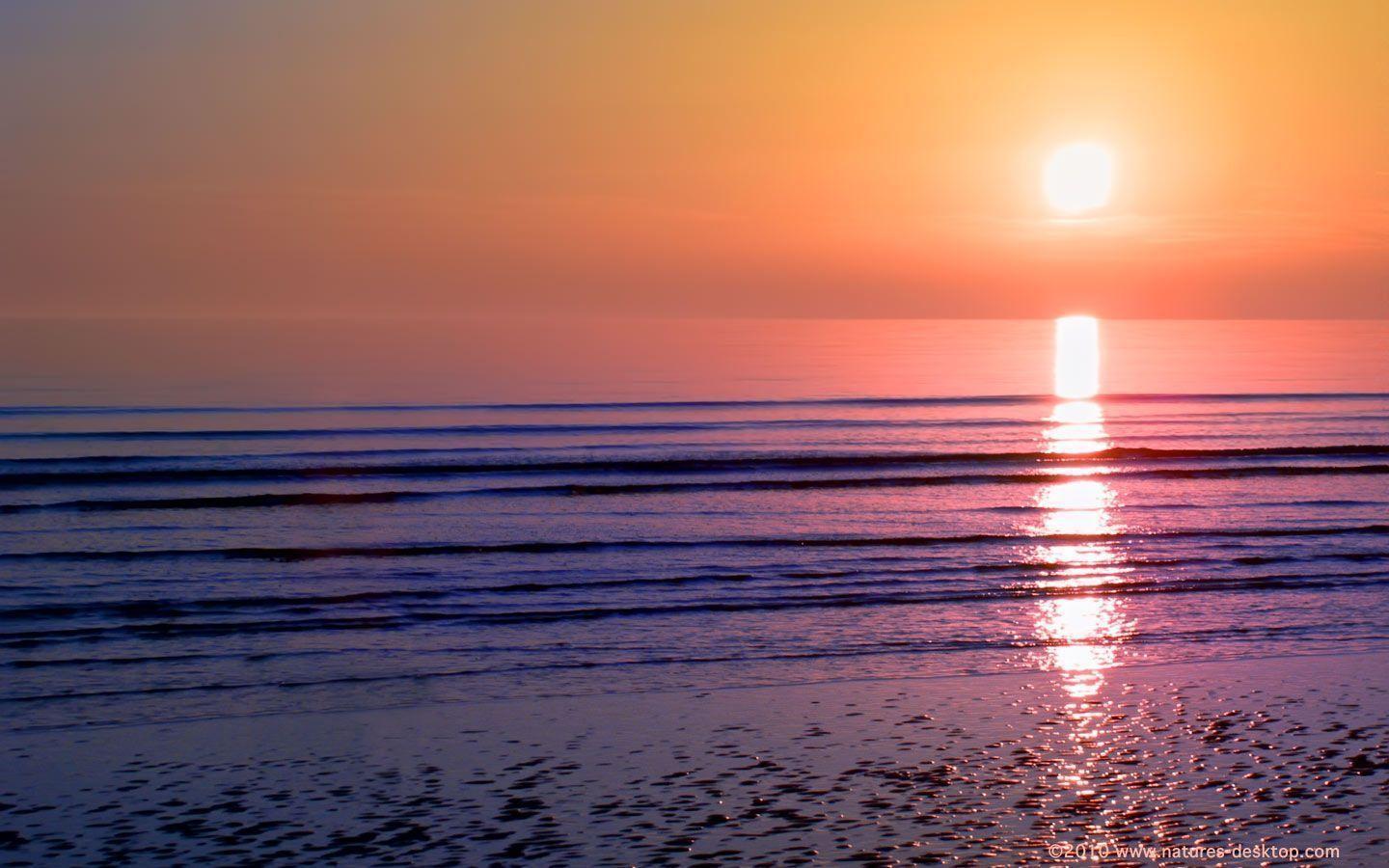Sunset Over Calm Ocean Background 1440x900 pixels