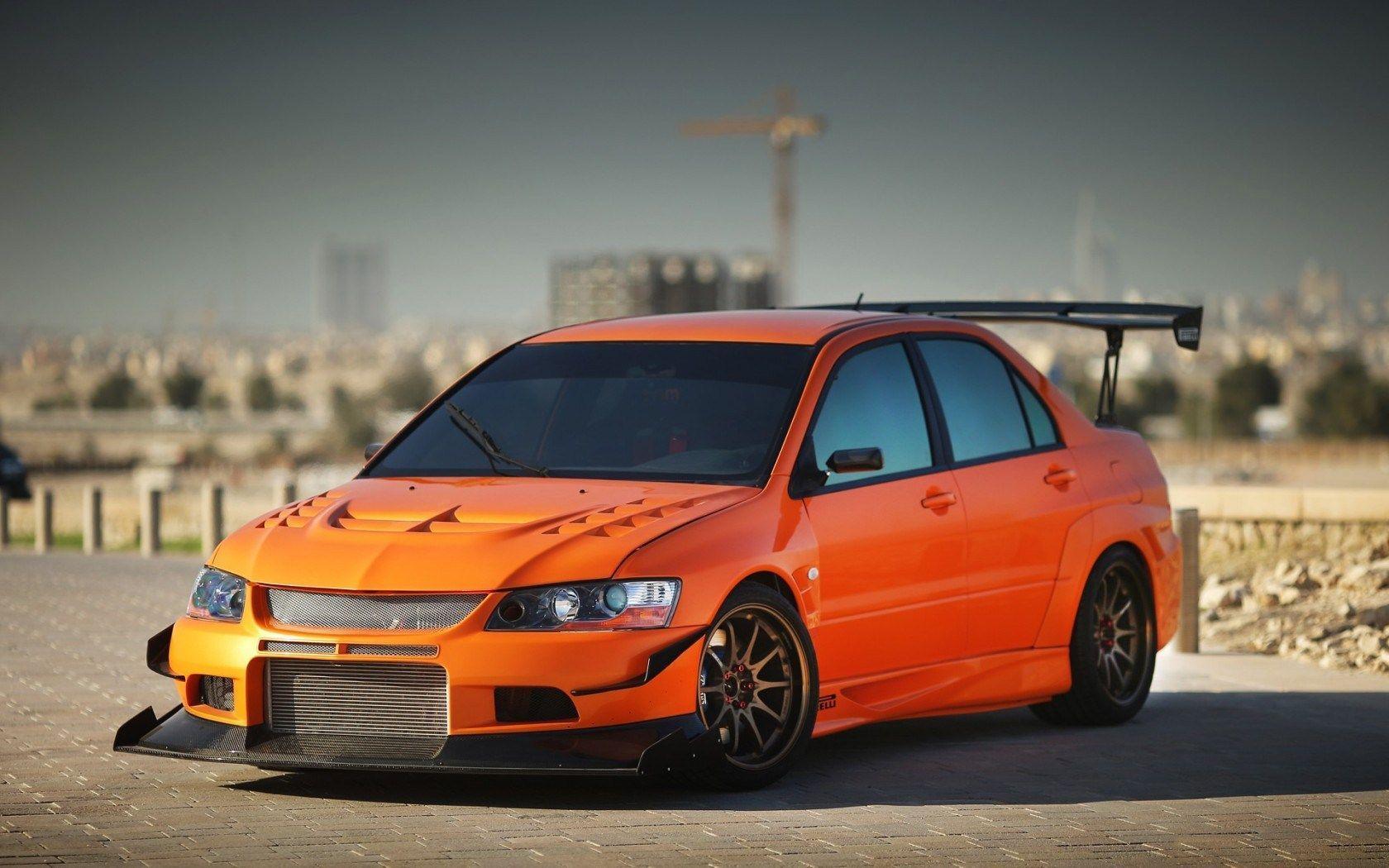 Orange Mitsubishi Lancer Evolution IX Pavement HD Wallpaper
