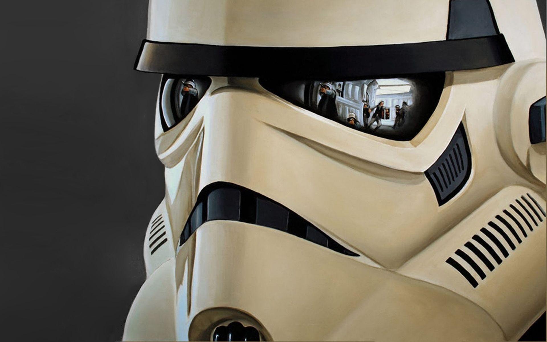 Stormtrooper helmet reflecting the battle Wallpaper #