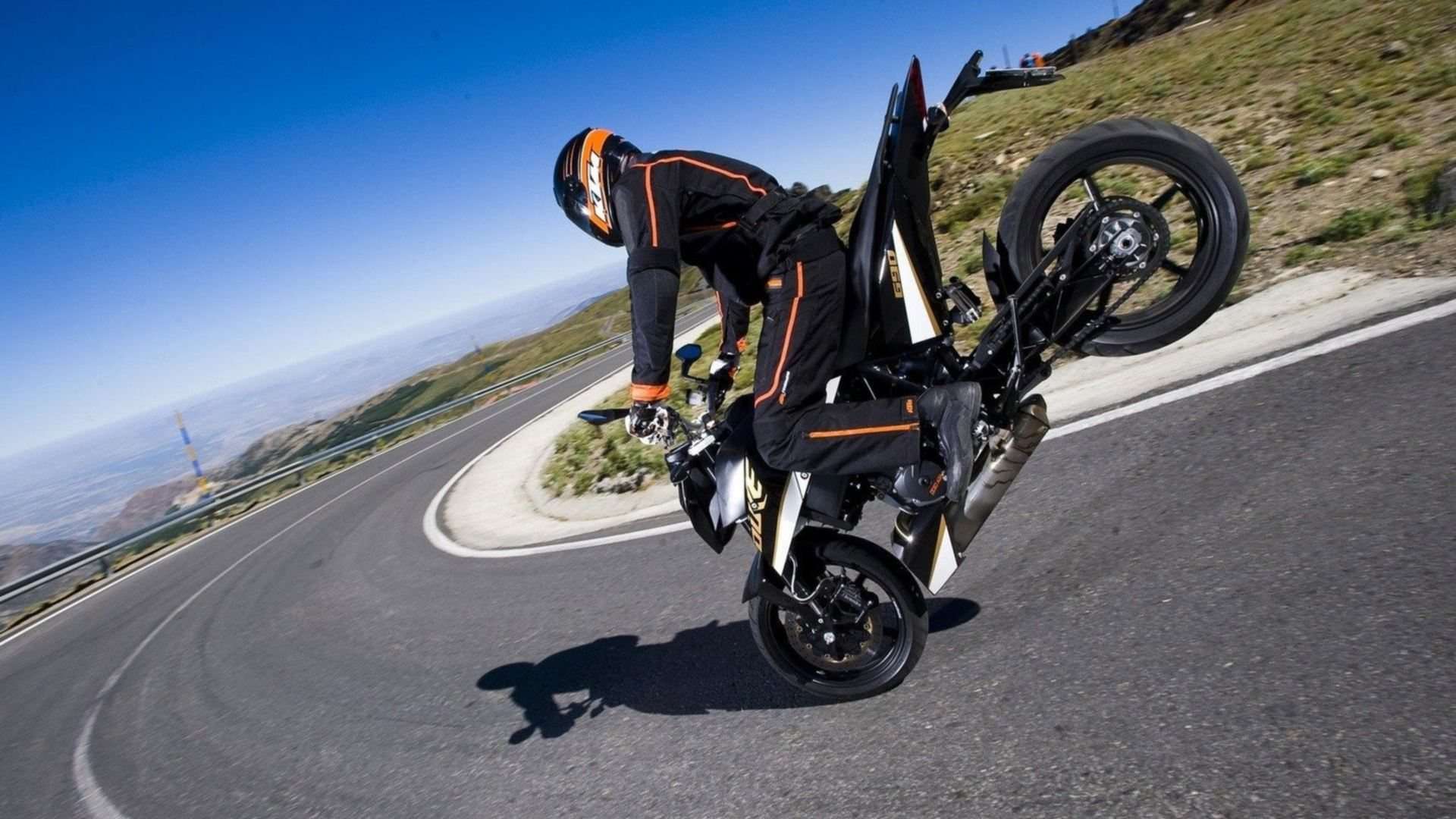 Motorcycle Acrobatics Desktop HD Widescreen Wallpaper. High