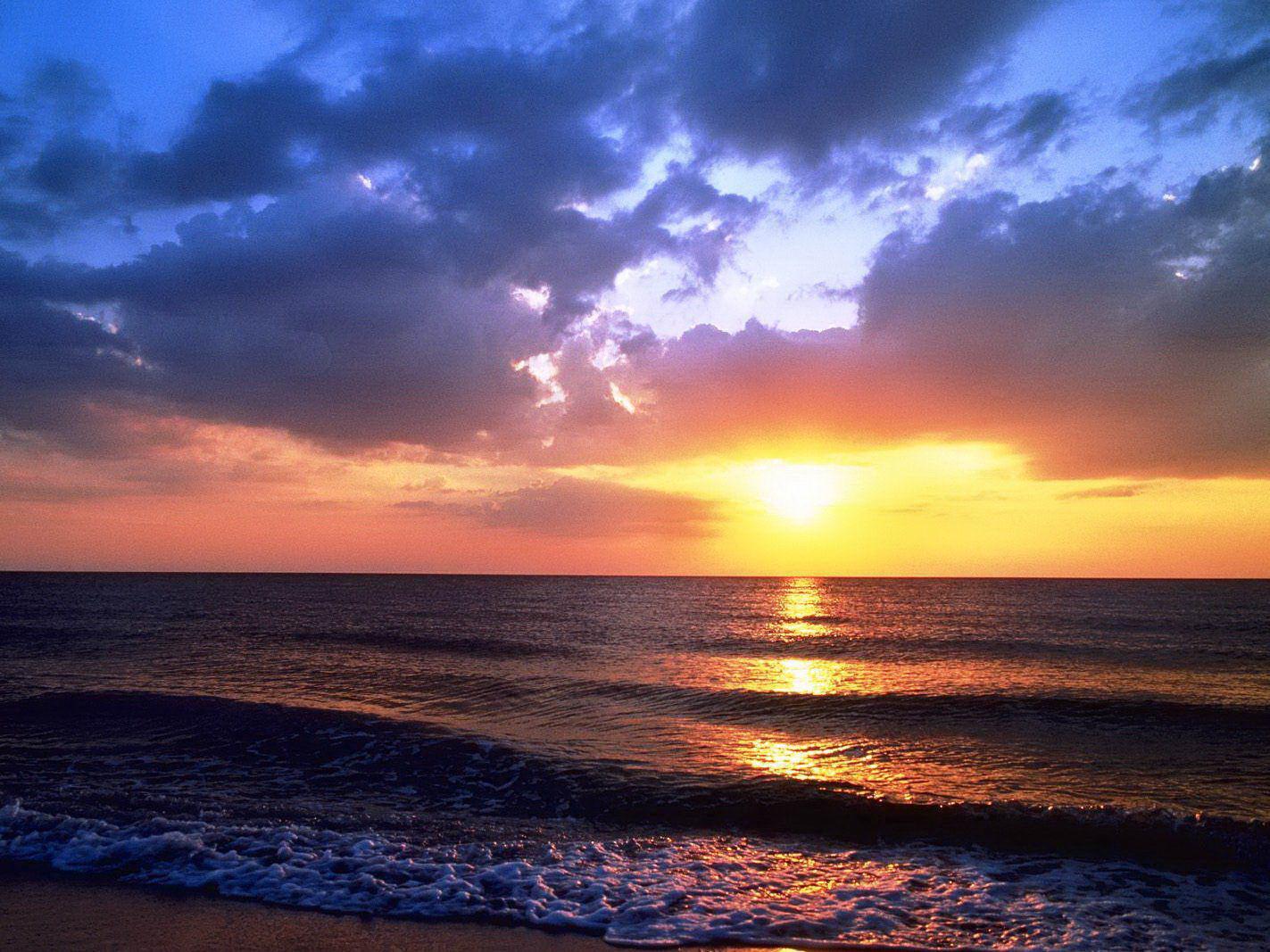 Coast shoreline sunset free desktop background wallpaper image