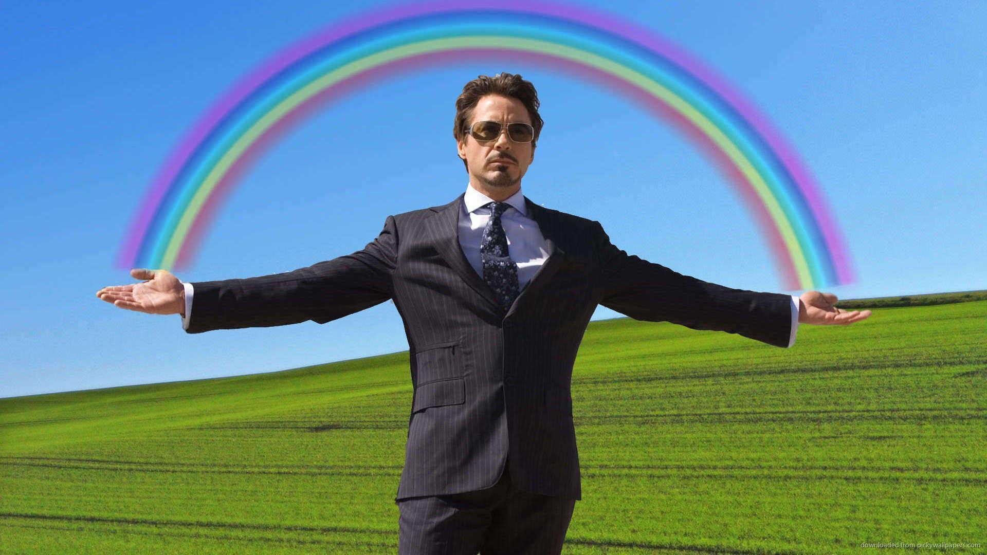 Tony Stark Holding A Rainbow Wallpaper For Blackberry Torch