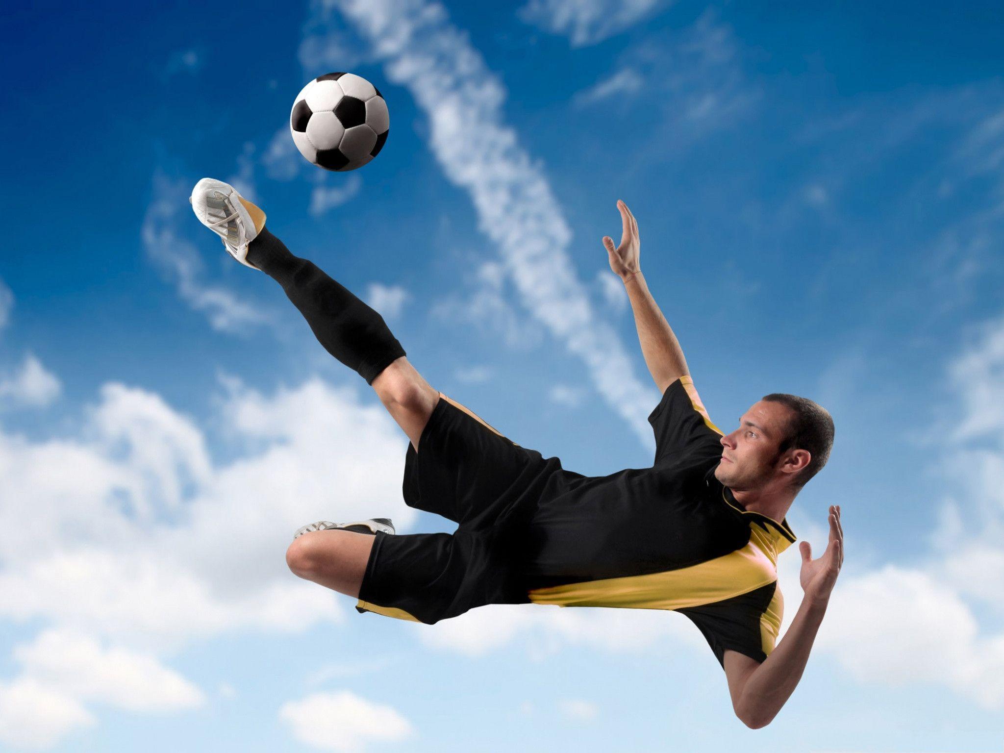 Free Sports Wallpaper, Football Player Kicking The Ball, Handsome