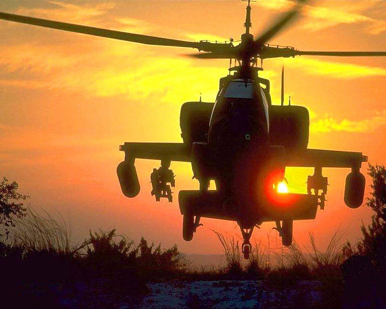 Military helicopter flying in sunset free desktop background