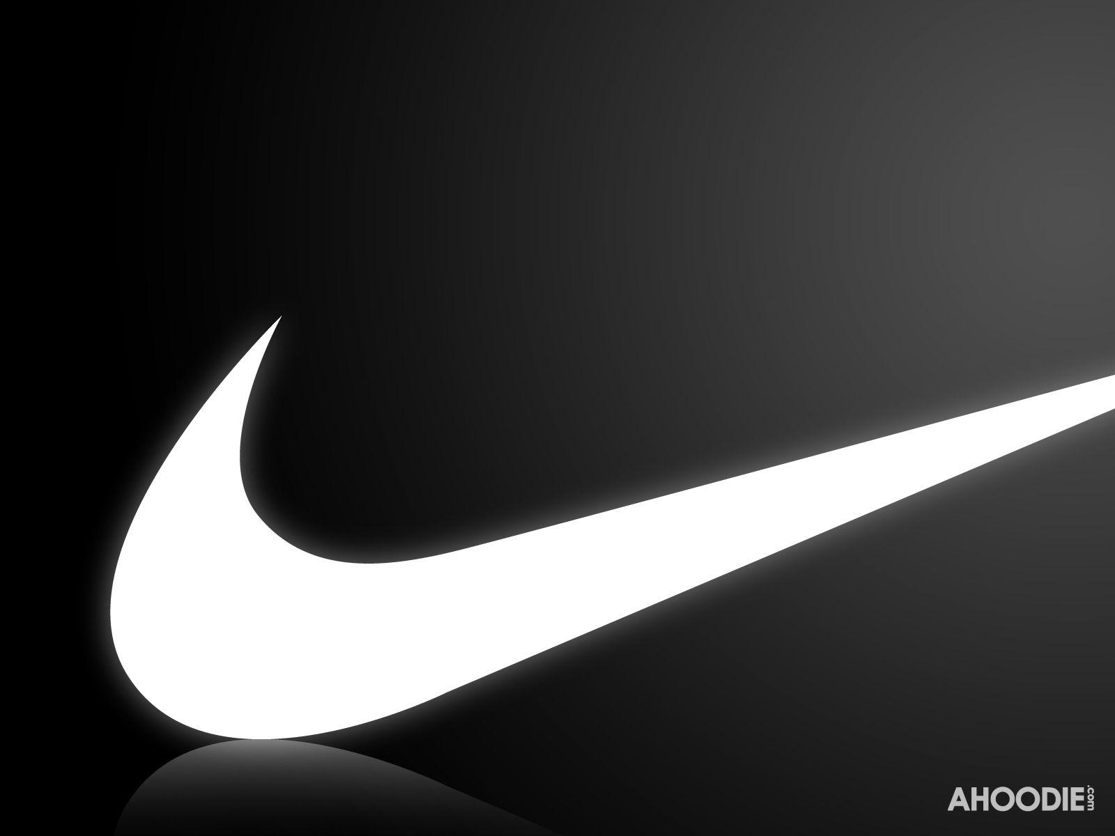 Wallpaper For > Blue Nike Logo With A Black Background