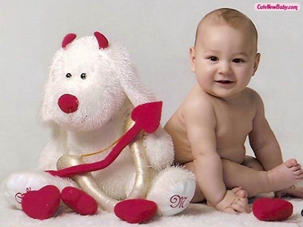 Download Cute Baby Boy With His Teddy Bear Cutenewbaby Wallpaper
