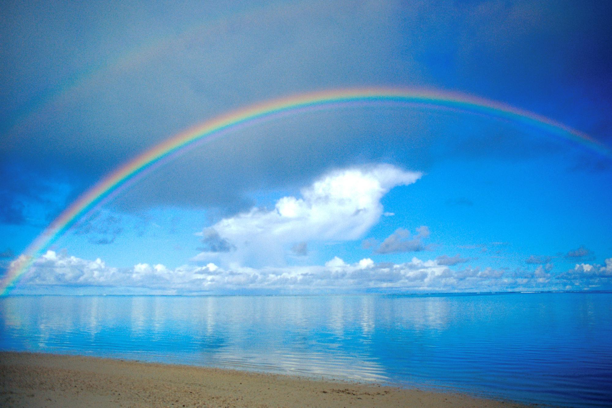 Rainbow over sea free desktop background wallpaper image