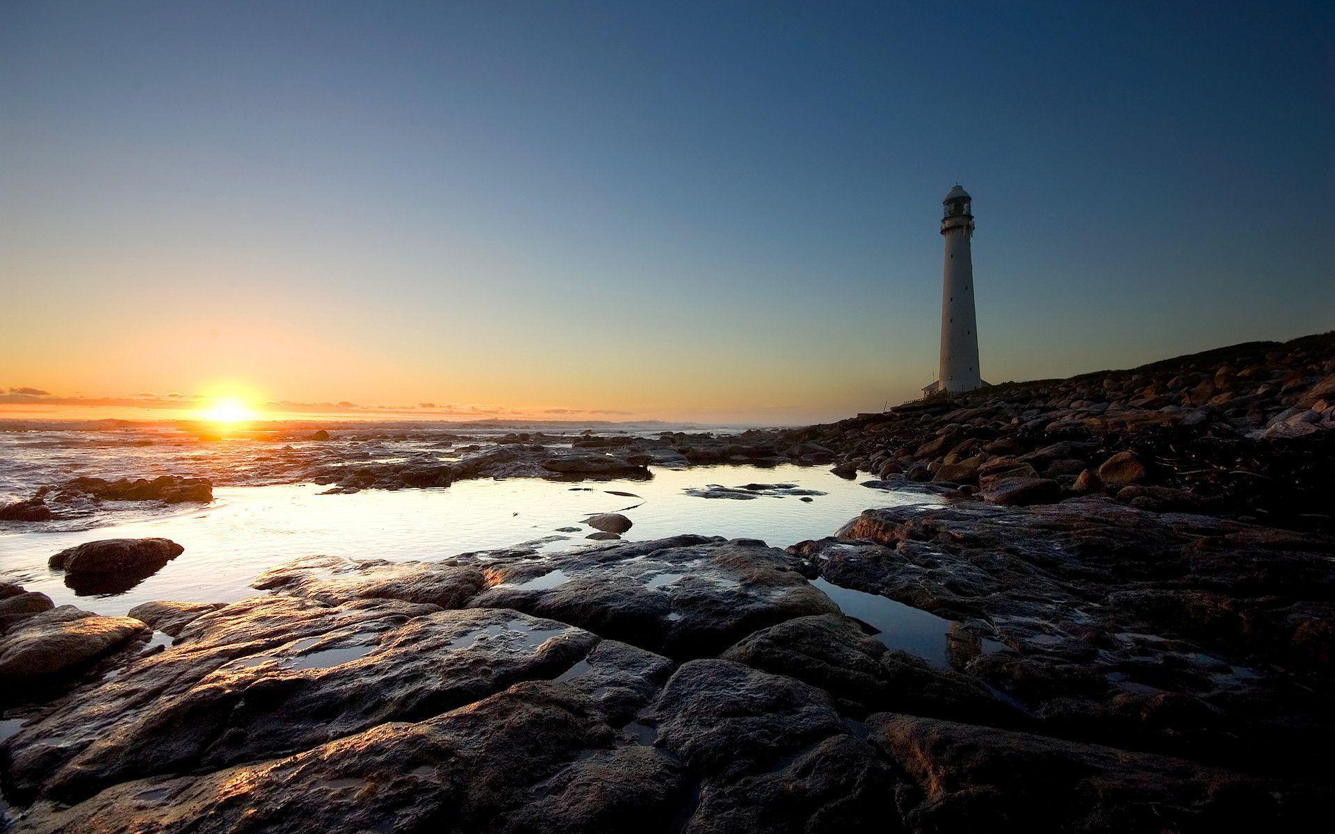 Beach Lighthouse at Sunrise Free and Wallpaper