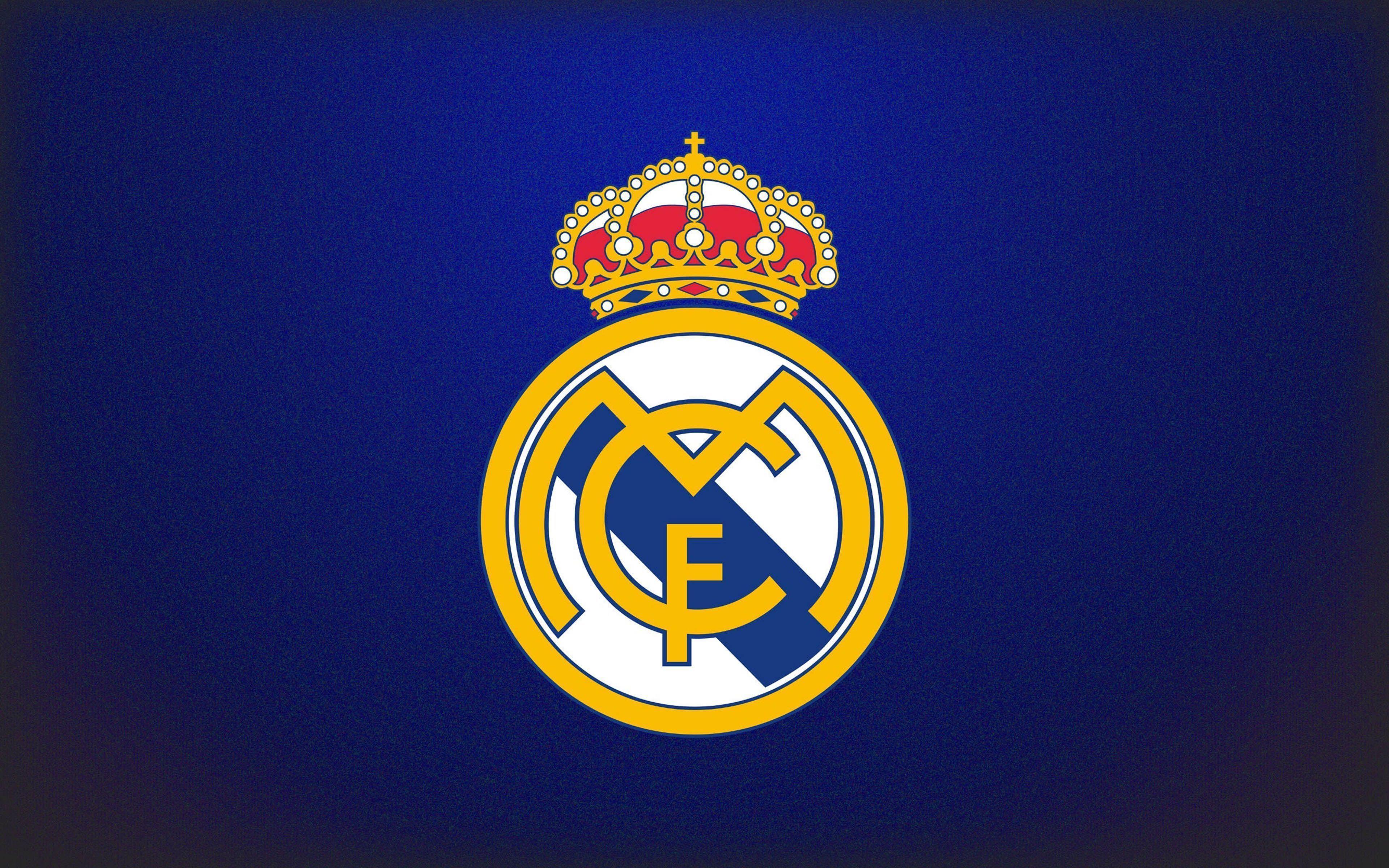 Real Madrid Logo Blue Background Wallpaper