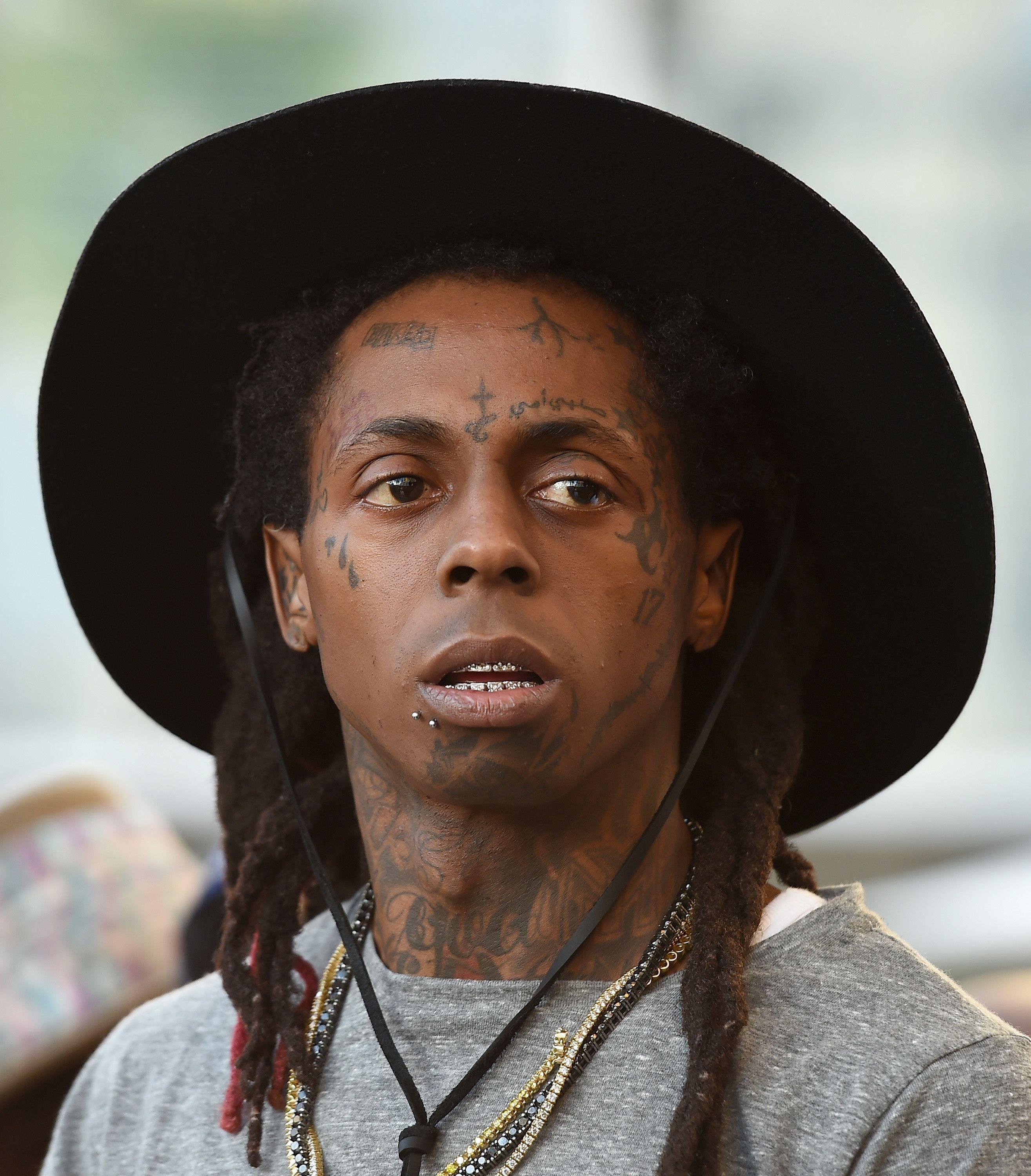 This Guy Is Trying To Look Just Like Lil Wayne! People Are Calling