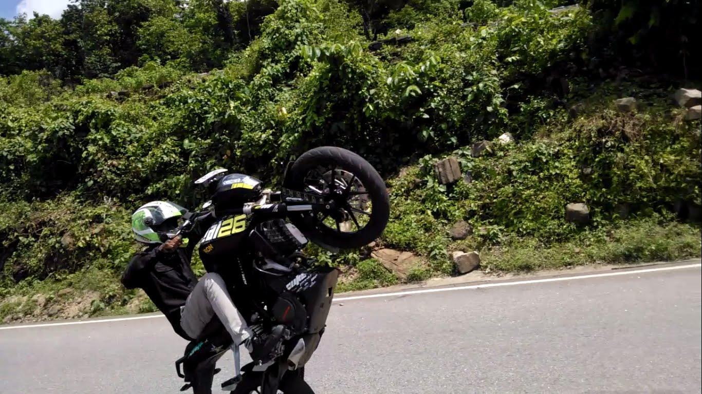 Bike stunt in dangerous hill by indian boy.mp4