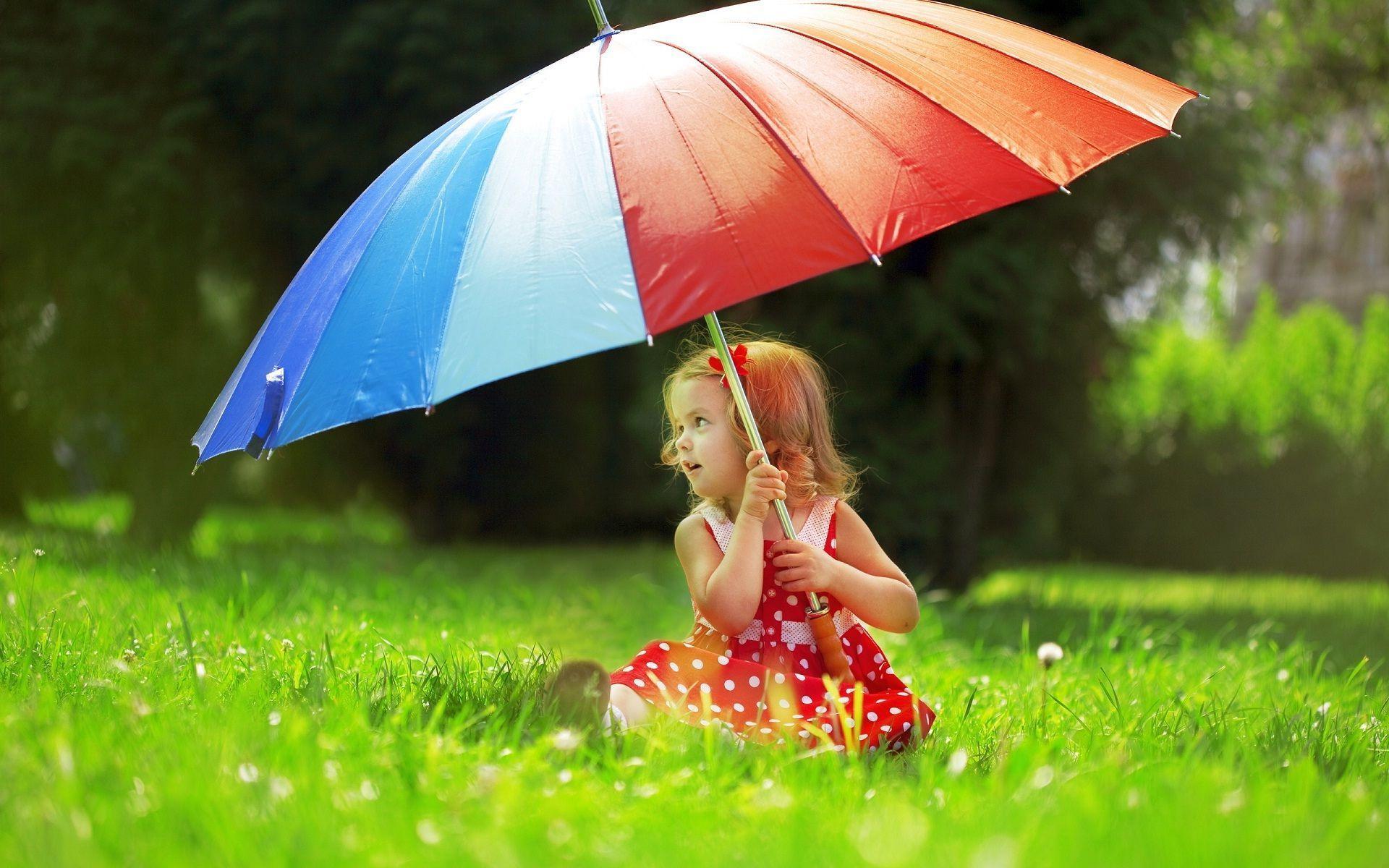 Beautiful Cute Baby Girl With Umbrella