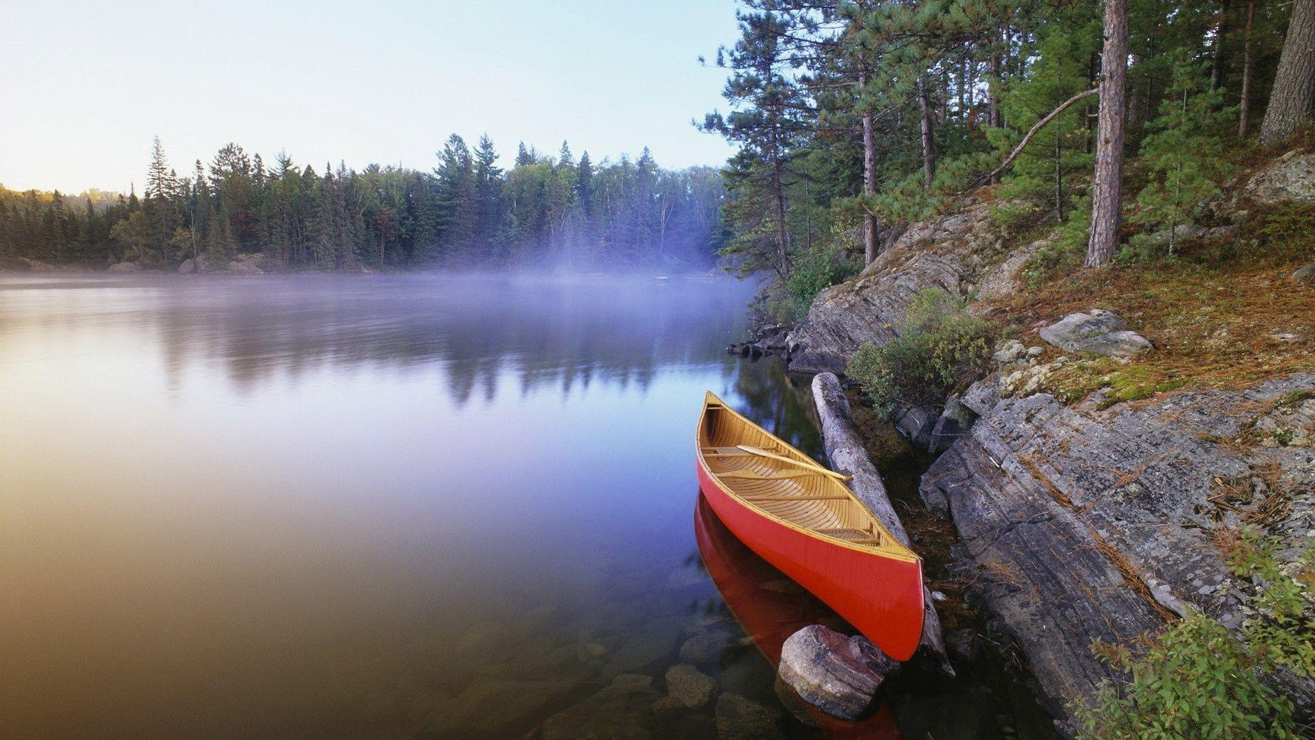 Canoe On The Morning Lake Wallpaper