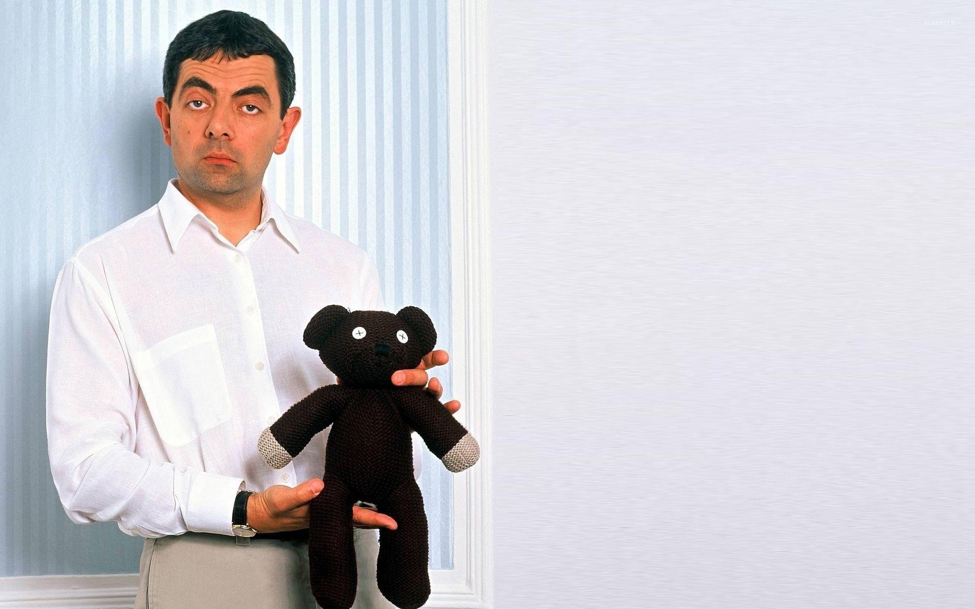 Mr. Bean with his teddy bear wallpaper Show wallpaper