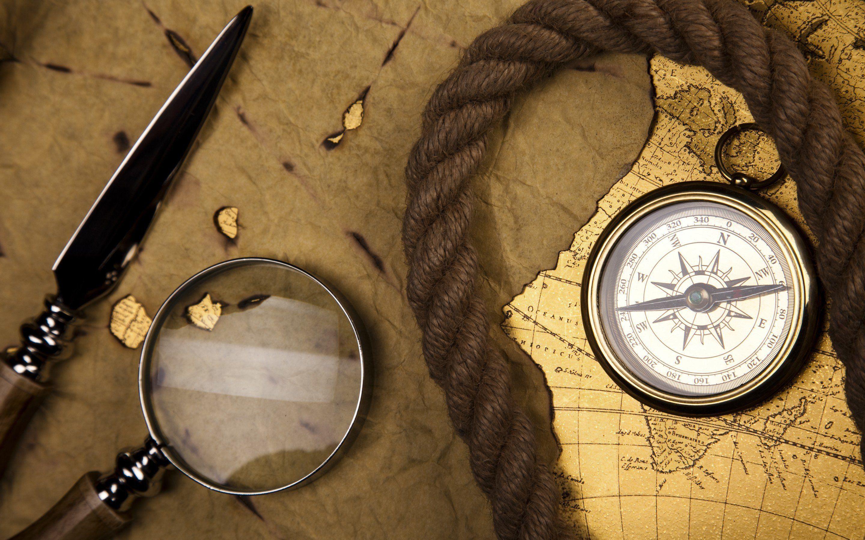 Magnifying Glass And Compass Wallpaper