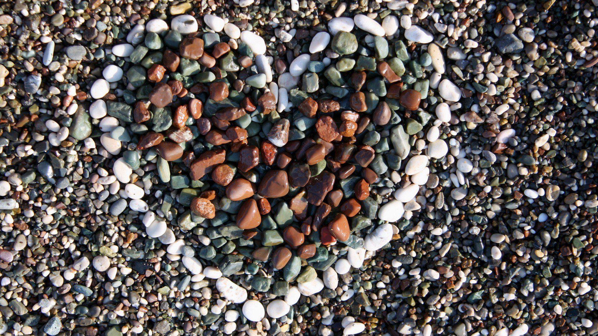 Beach Pebbles Forming A Heart Wallpaper