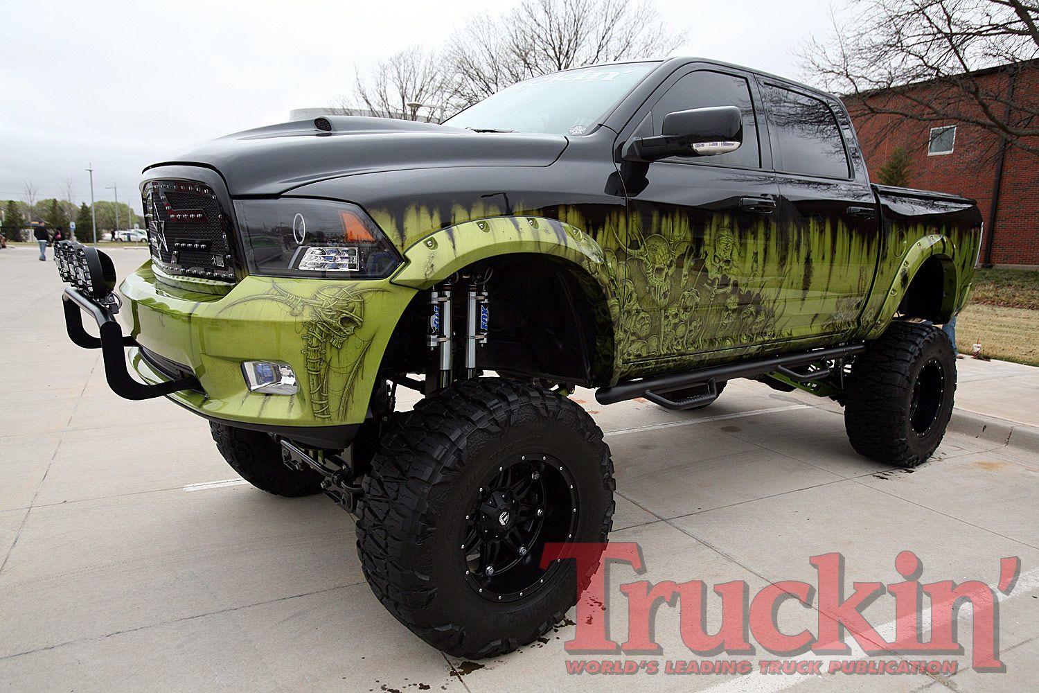 Dodge Ram two tone black and green lifted truck. Mean trucks