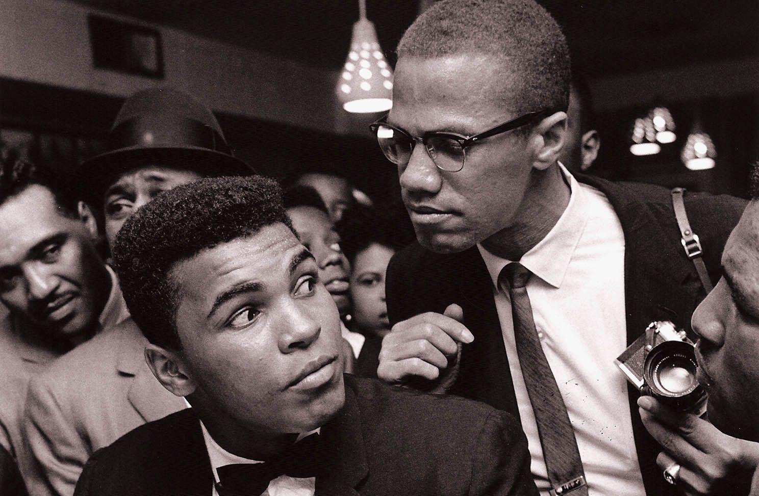 Photo of Muhammad Ali with Malcolm X