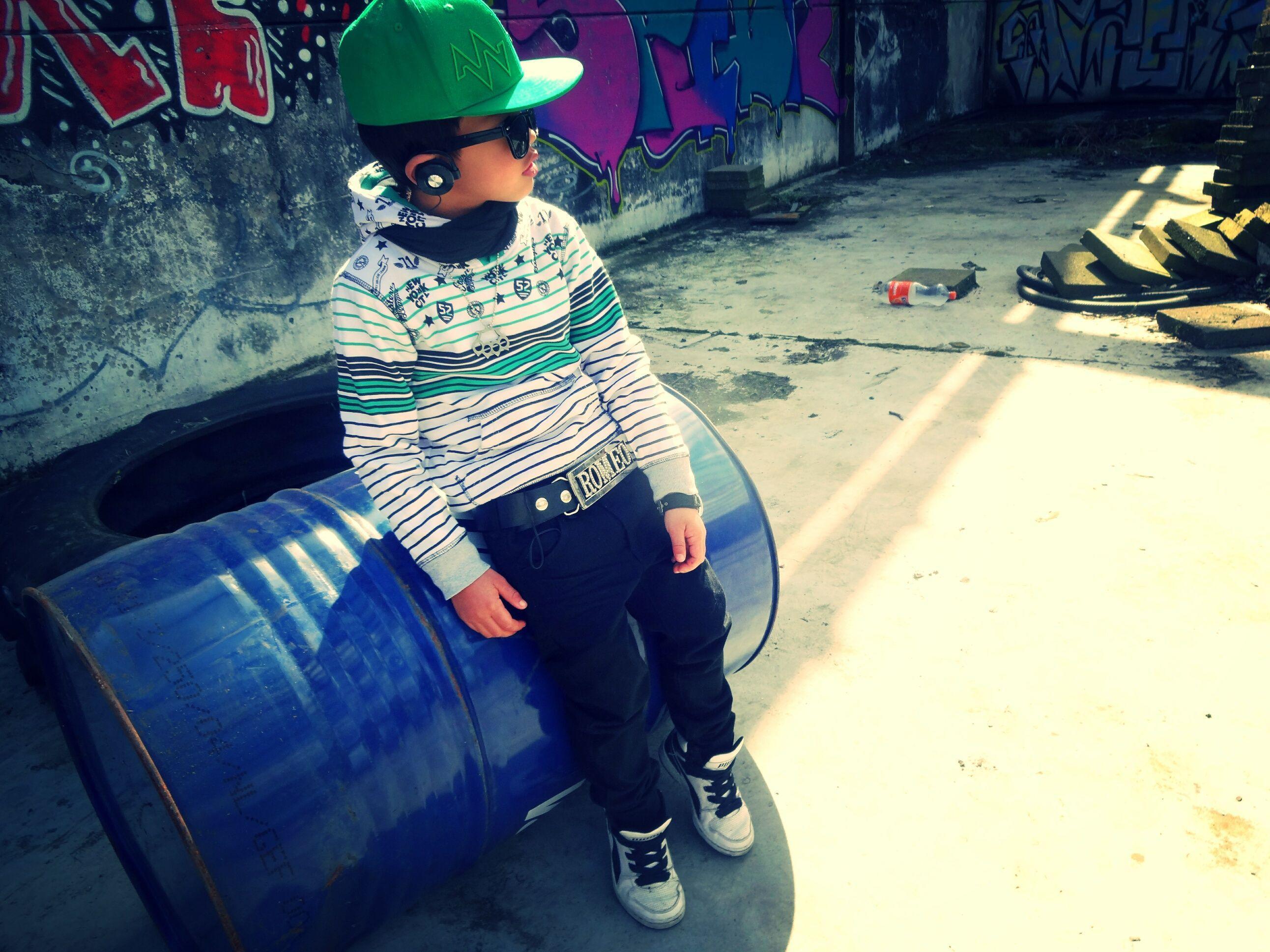 A boy in a green cap and barrel, swag wallpaper and image