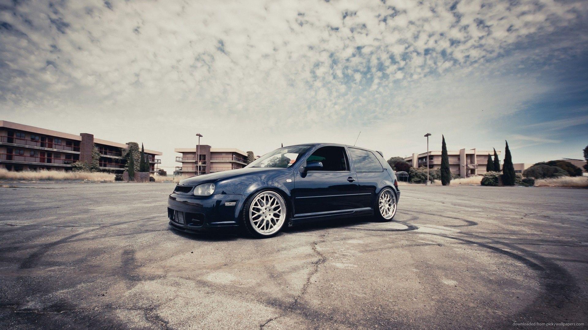 Black Volkswagen Golf On A Square Wallpaper For iPhone 4