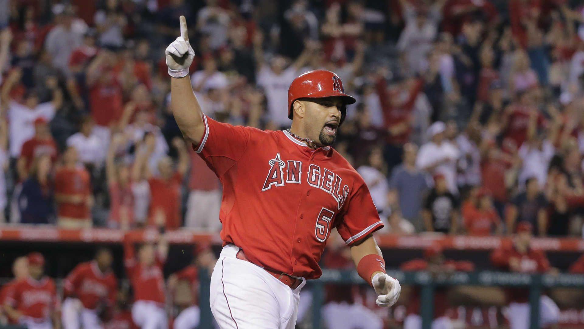 Albert Pujols on a tear, but still falling behind company he used