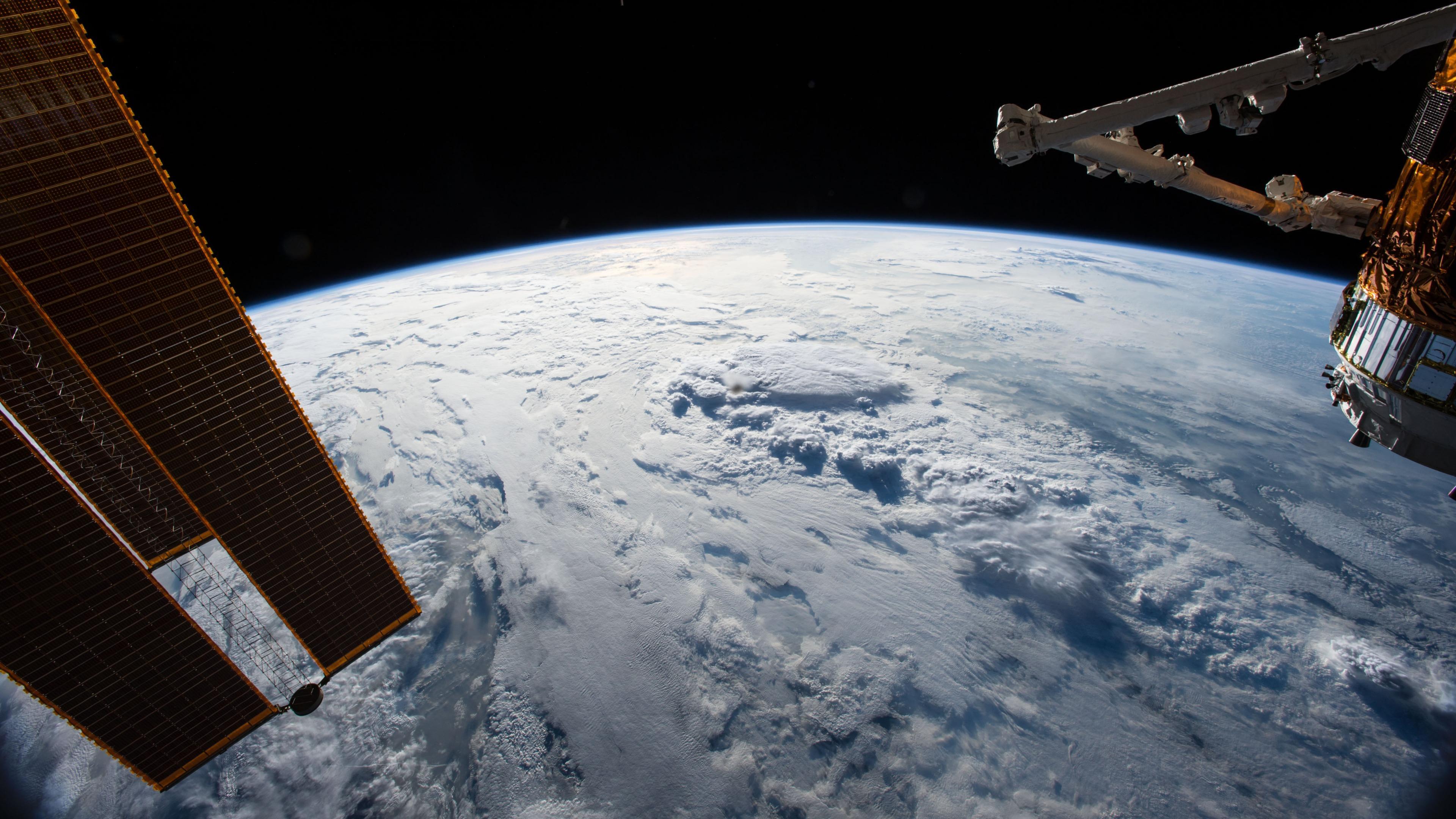 Sunlight Shines On The International Space Station 4K UltraHD