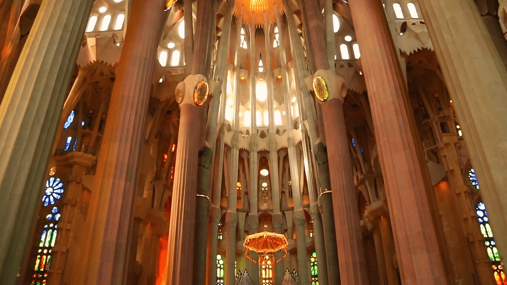 Tilting shot of the interior of the La Sagrada Familia Gaudi church