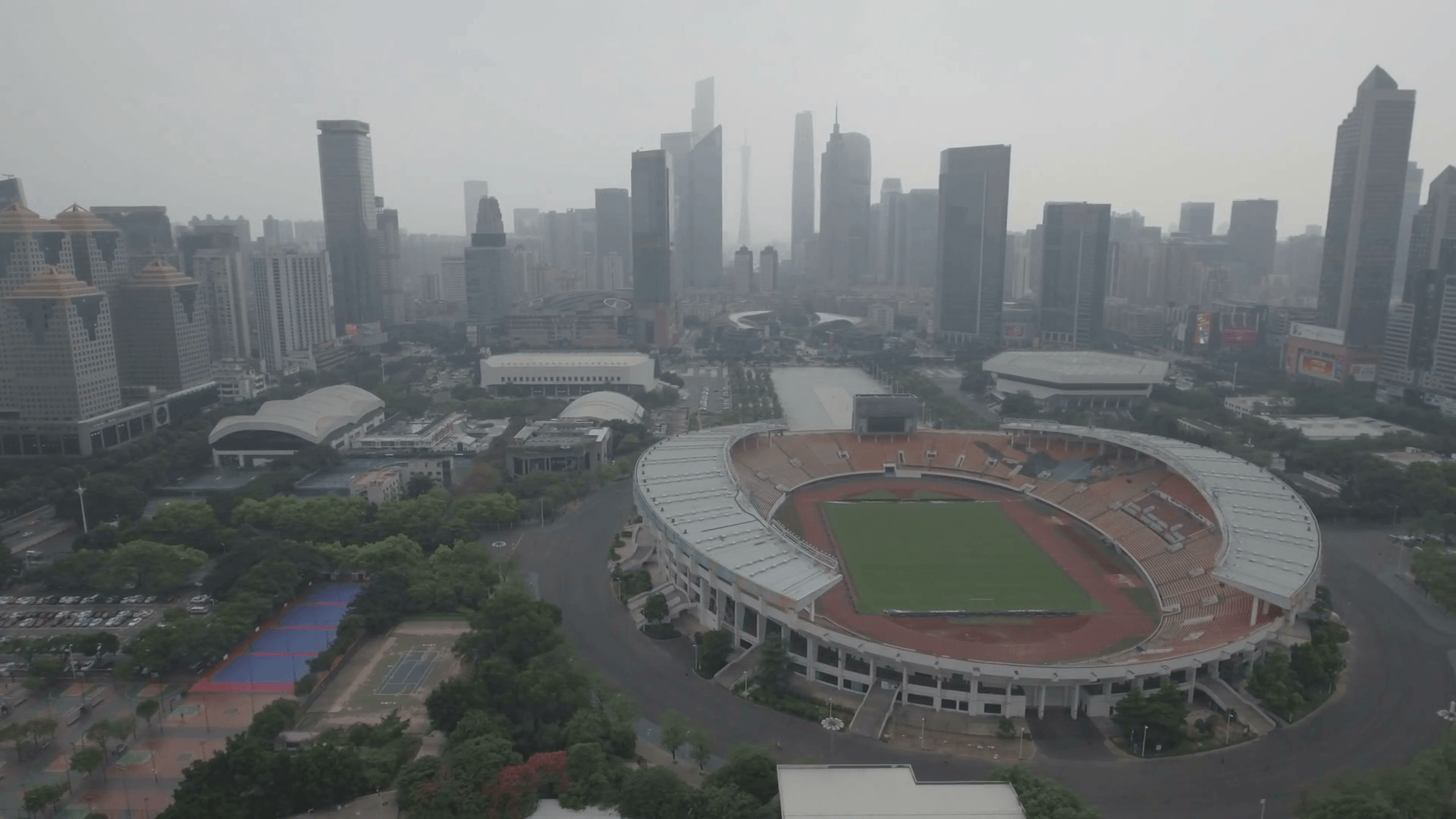 Panning aerial view of the stadium of the Guangzhou Evergrande