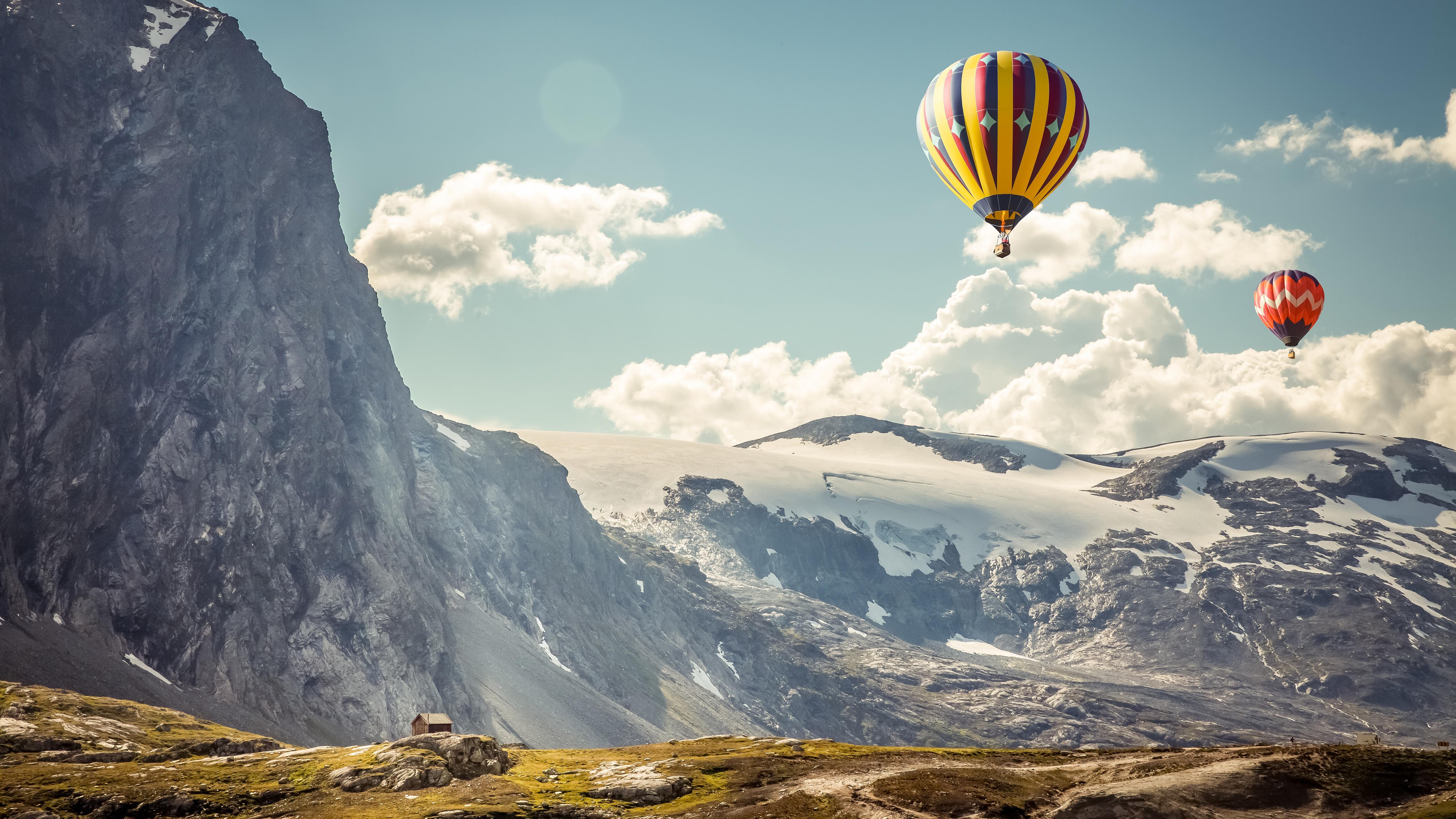 Download 5120x2880 Hot Air Balloon, Scenic, Mountain, Clouds, House
