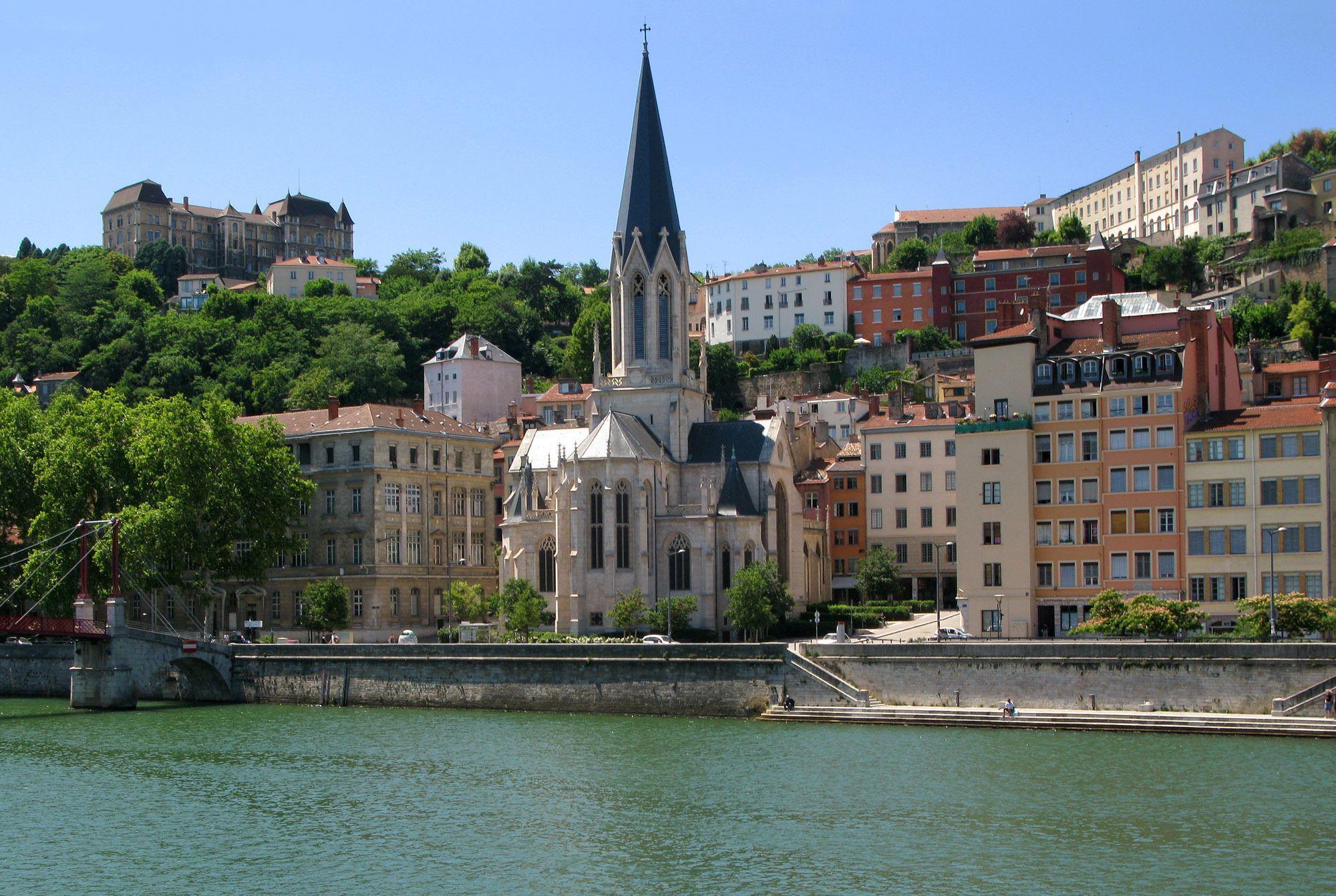 Church on the waterfront in the city of Lyon, France wallpaper