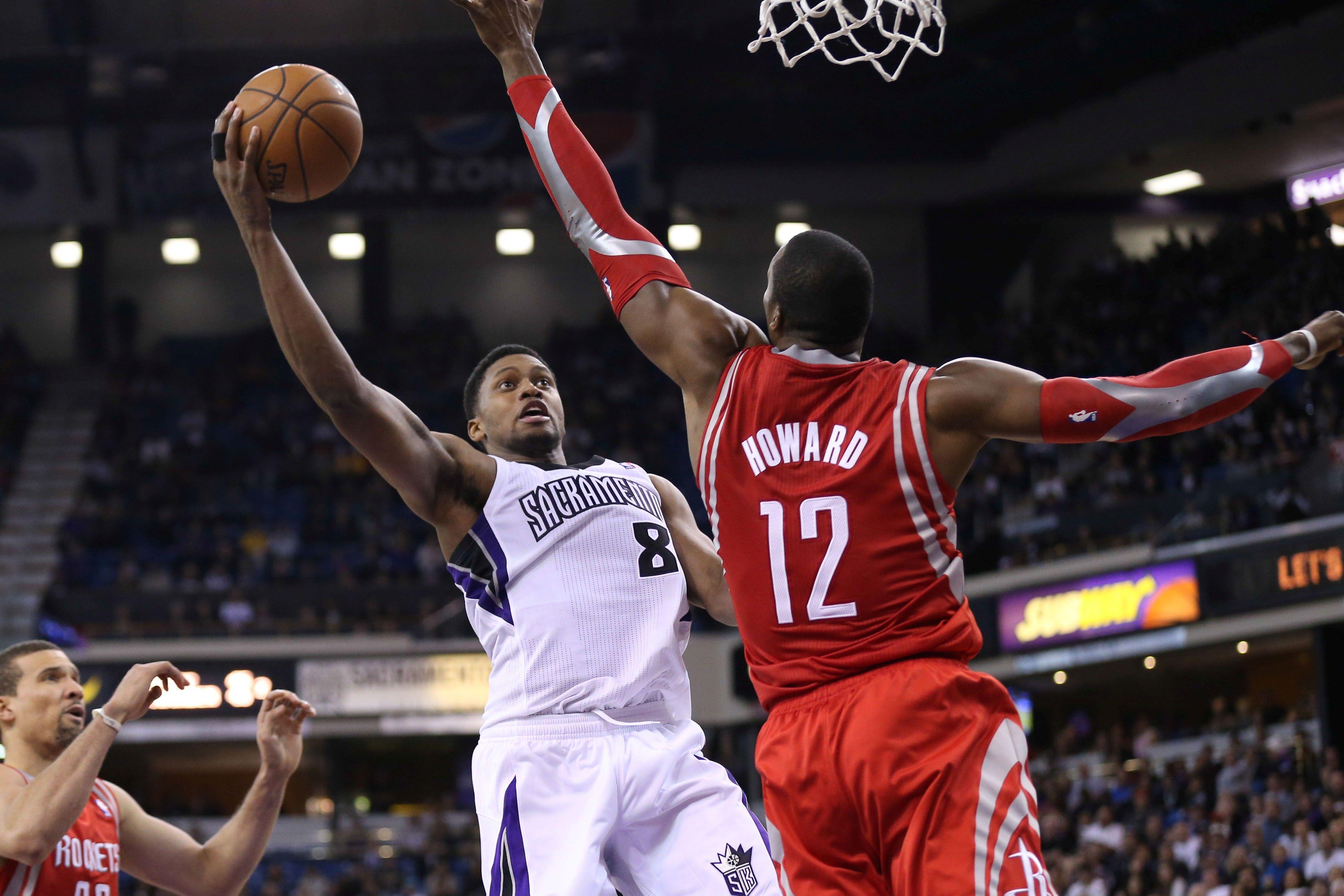 Popular American Basketball Player Rudy Gay Ball Dunk in Basket