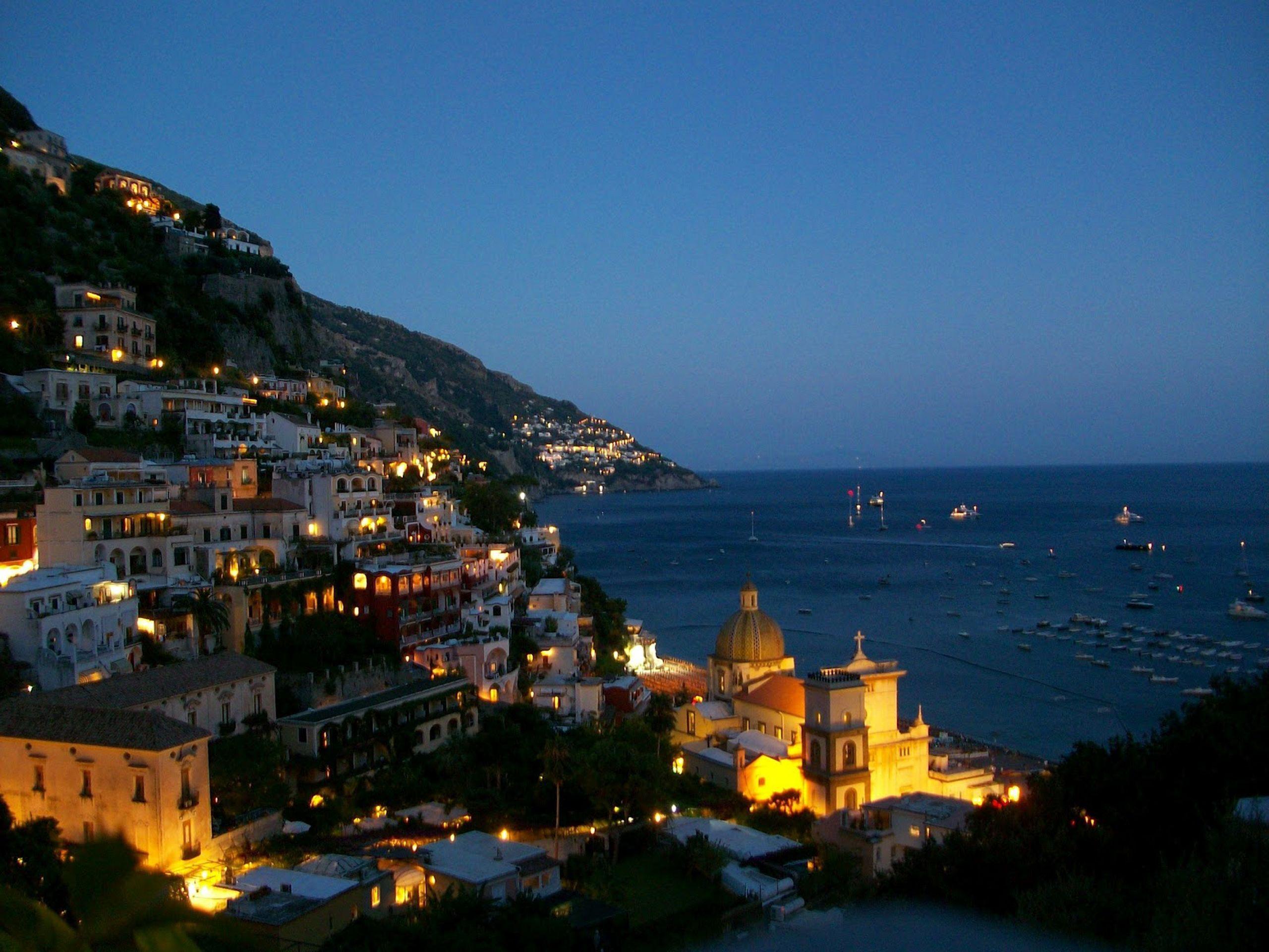 Evening lights at the resort in Amalfi, Italy wallpaper