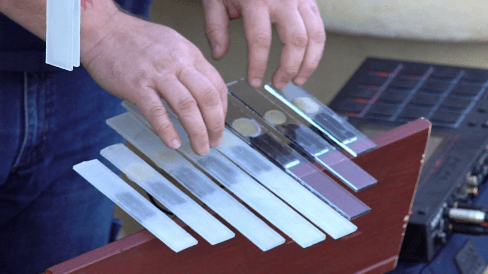Close Up, The Musician's Hands Playing On The Glass Instrument