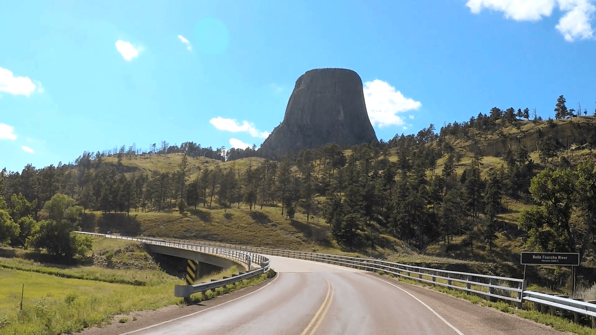 POV driving Devils Tower a National Monument in Wyoming USA Stock