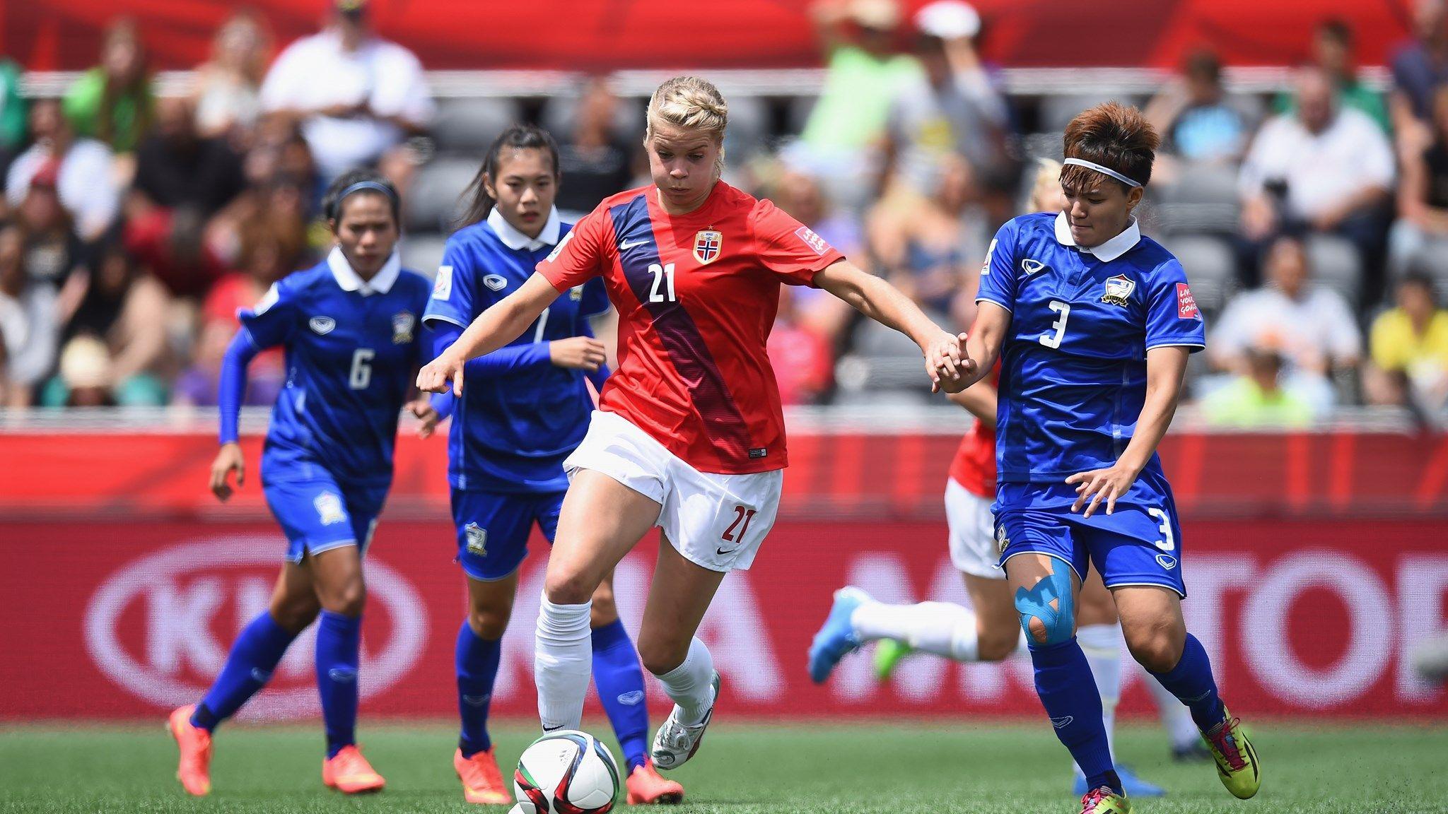 Ada Hegerberg of Norway is challenged