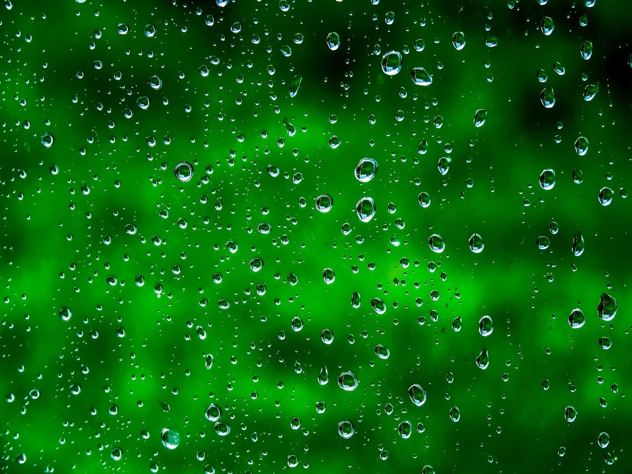 Raindrops Glass Wallpaper photo