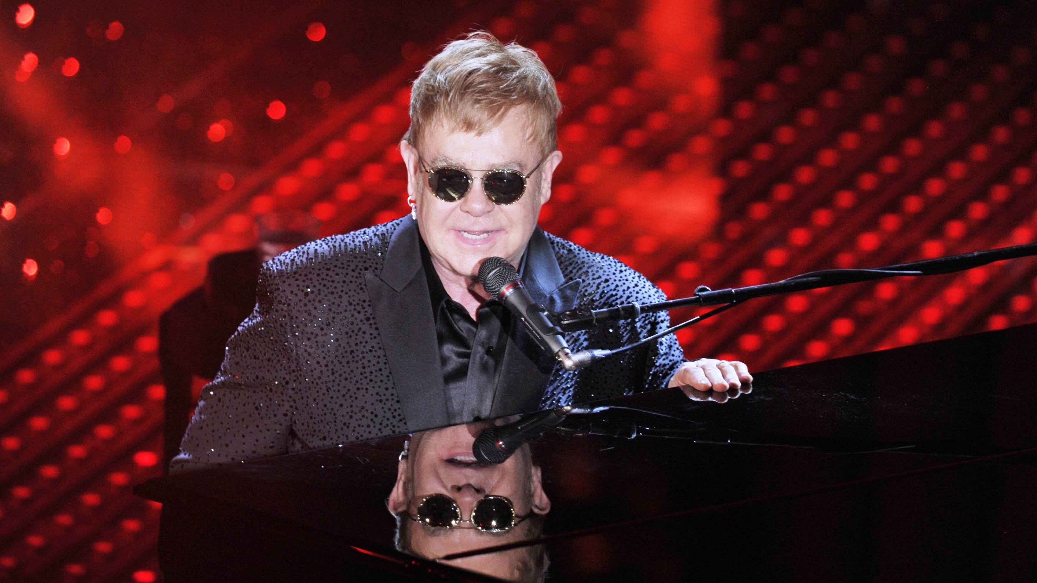 Elton John Wallpaper Image Photo Picture Background