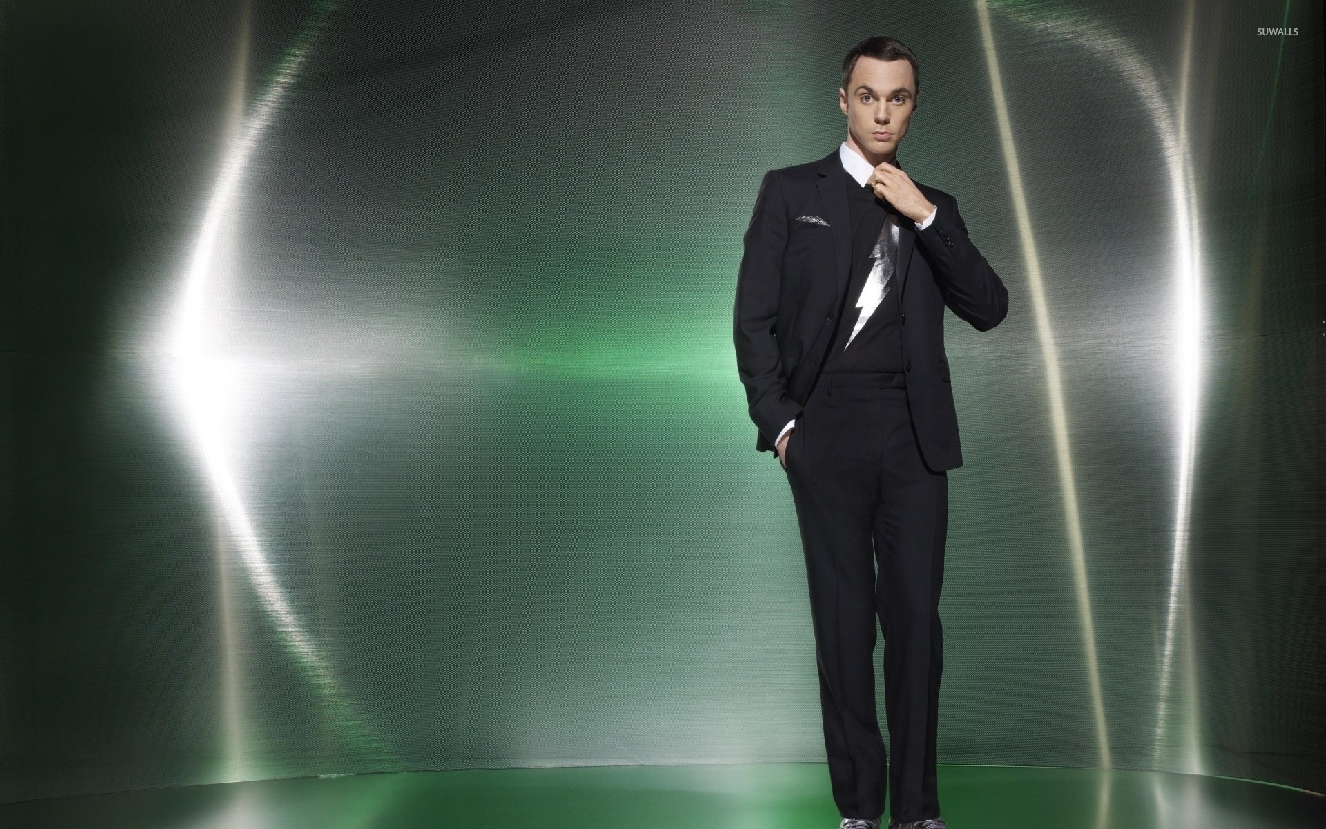 Jim Parsons in a black suit and a hand in his pocket wallpaper