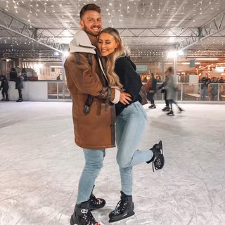 Ice skating couple wallpaper
